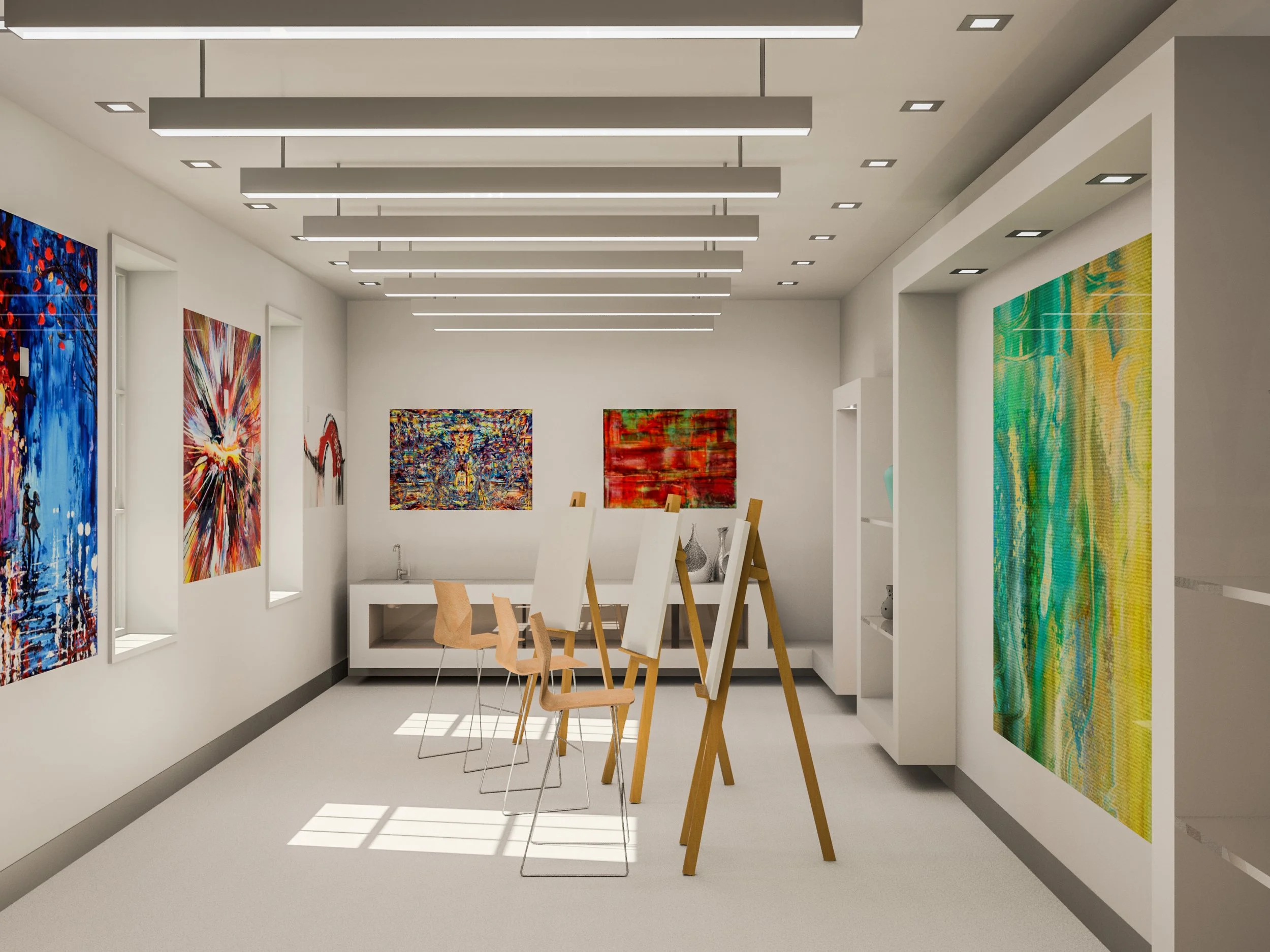 An art gallery with colorful abstract paintings displayed on white walls, wooden chairs and small tables, and modern ceiling lights.