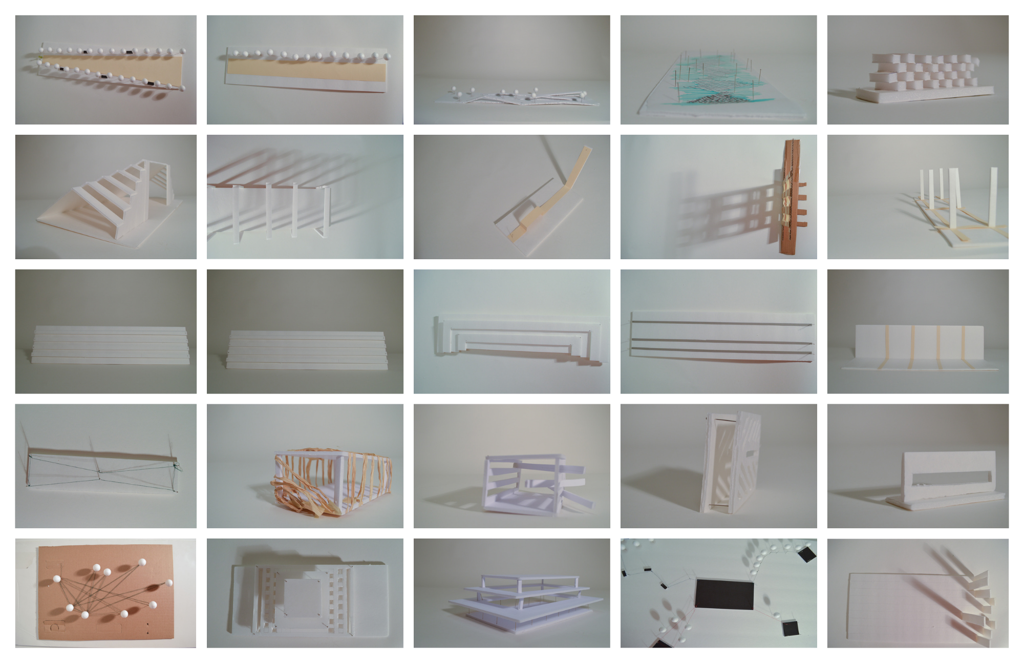 A collection of architectural models and design prototypes, including ramps, stairs, platforms, and structural frameworks, arranged on white tables and surfaces.