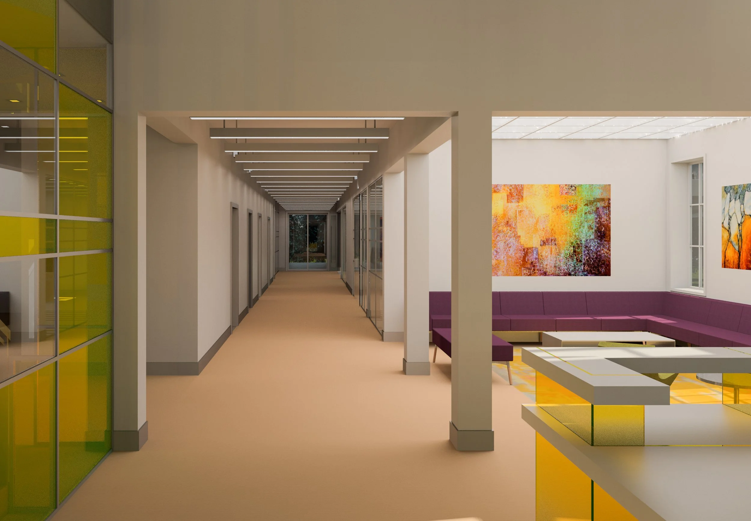 Modern interior hallway with art on the wall and colorful seating area.
