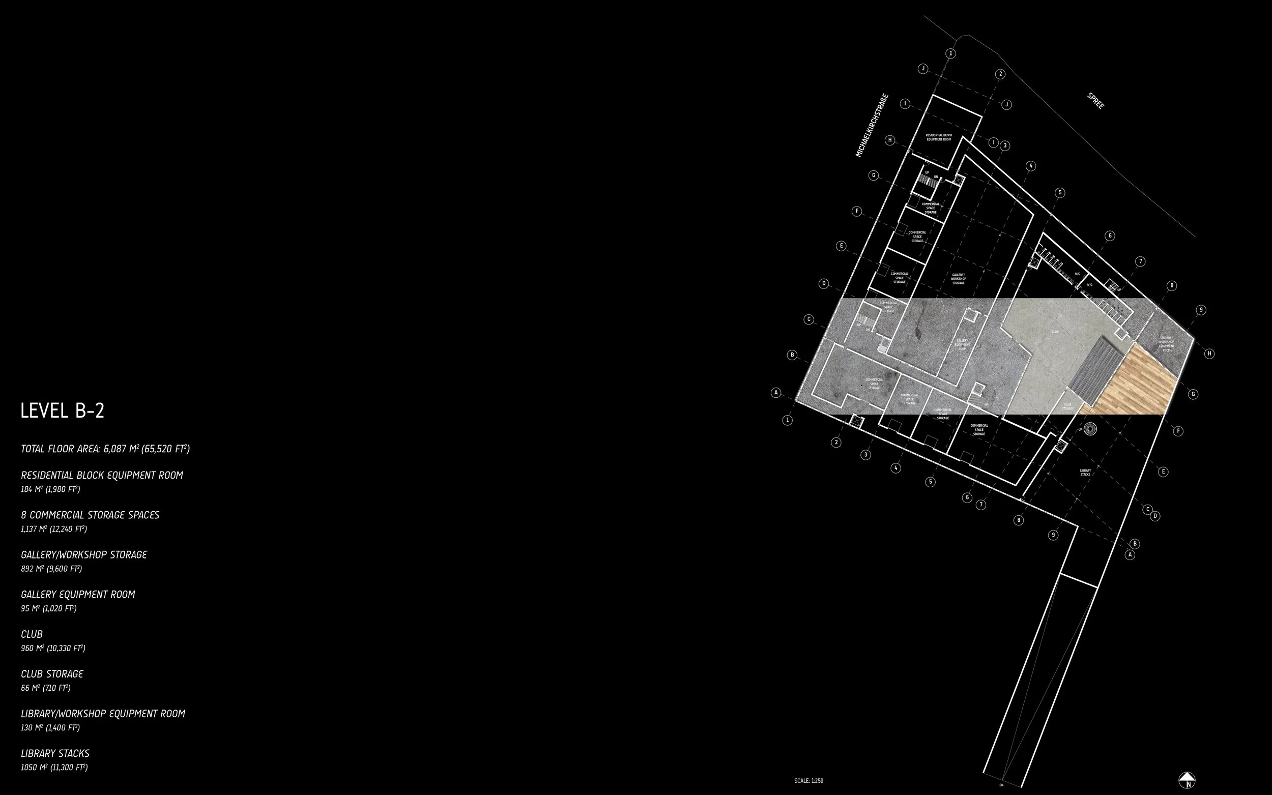 Architectural floor plan for Level B-2 of a building, showing layout of commercial, gallery, workshop, and storage spaces, with measurements and labels.