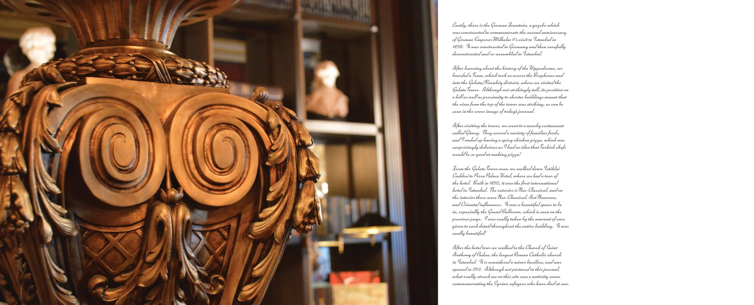 Close-up of an ornate wooden decorative piece with swirling patterns, set against a background of a room with bookshelves and bust sculptures.