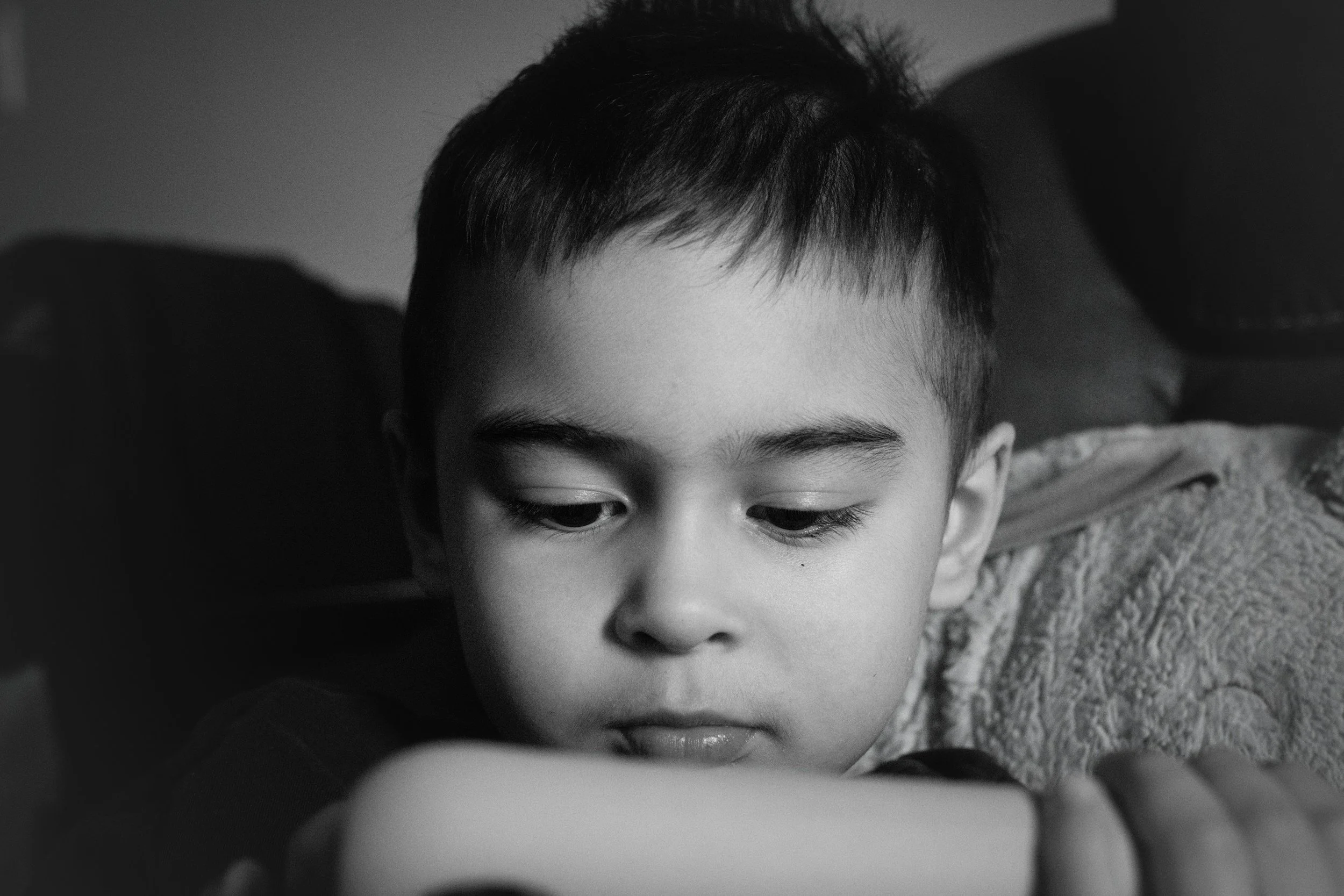 Adult reflecting on childhood emotional neglect and feeling disconnected