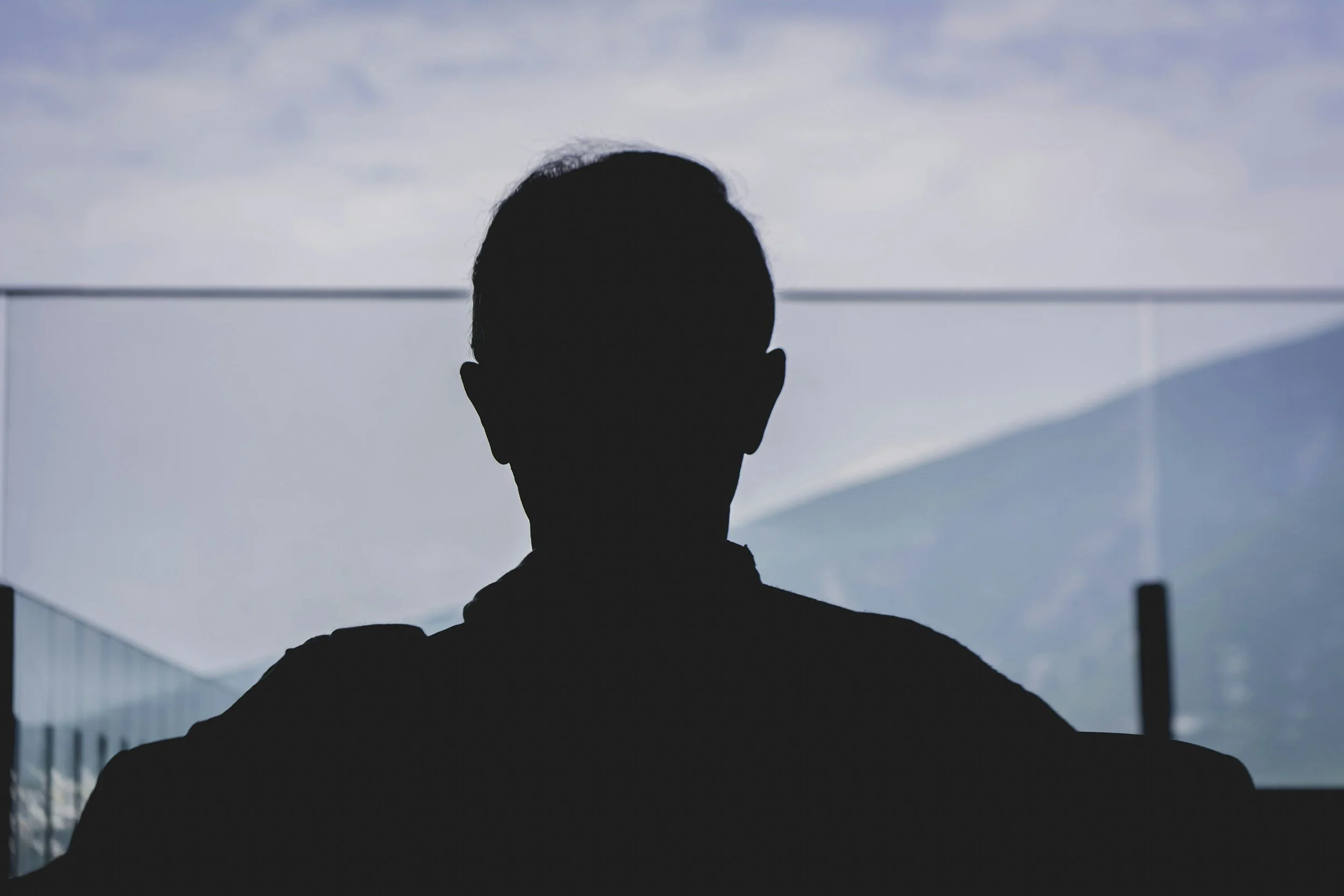 Person deep in thought appearing insightful but stuck and unable to move forward