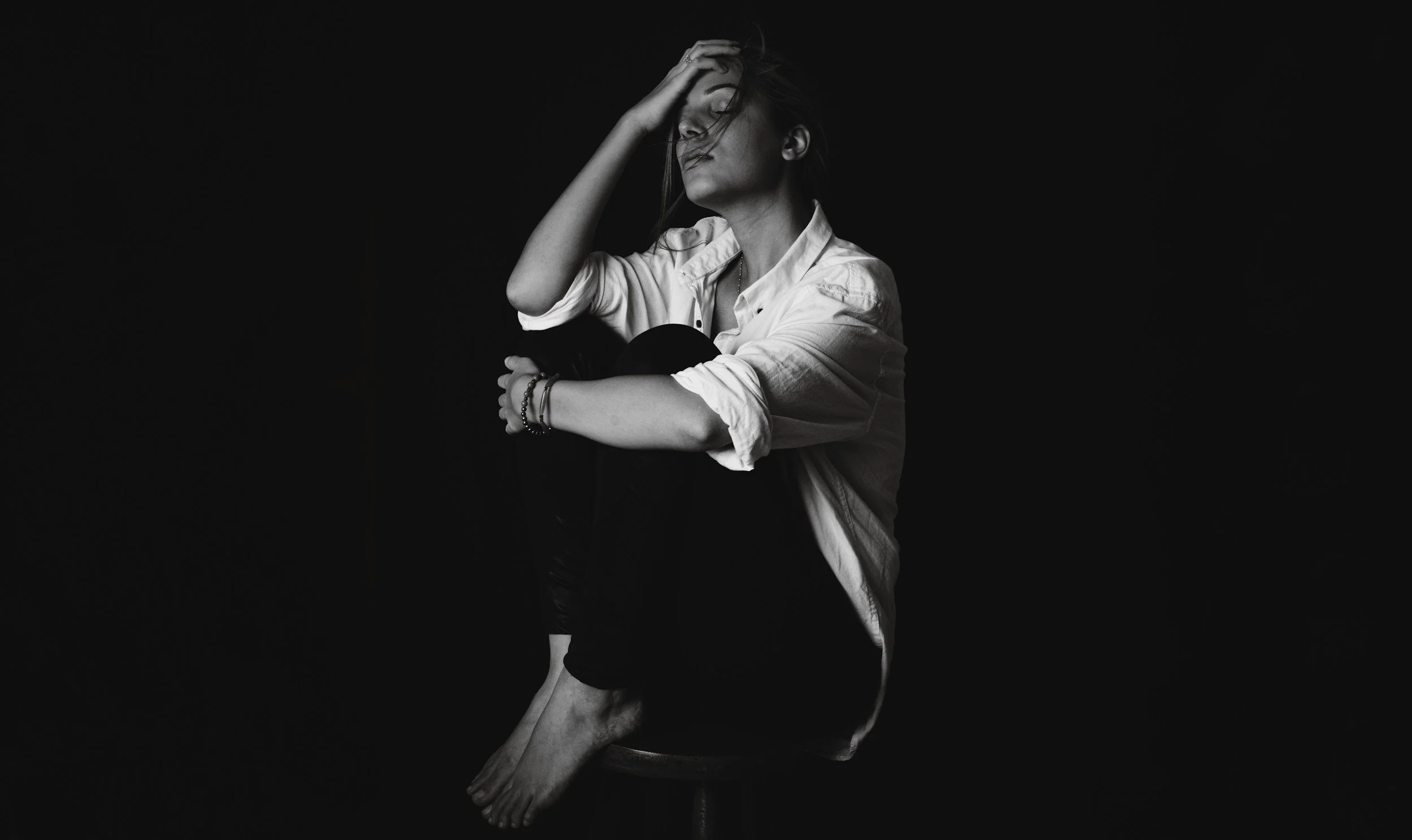 Person looking worried and imagining negative outcomes or worst-case scenarios
