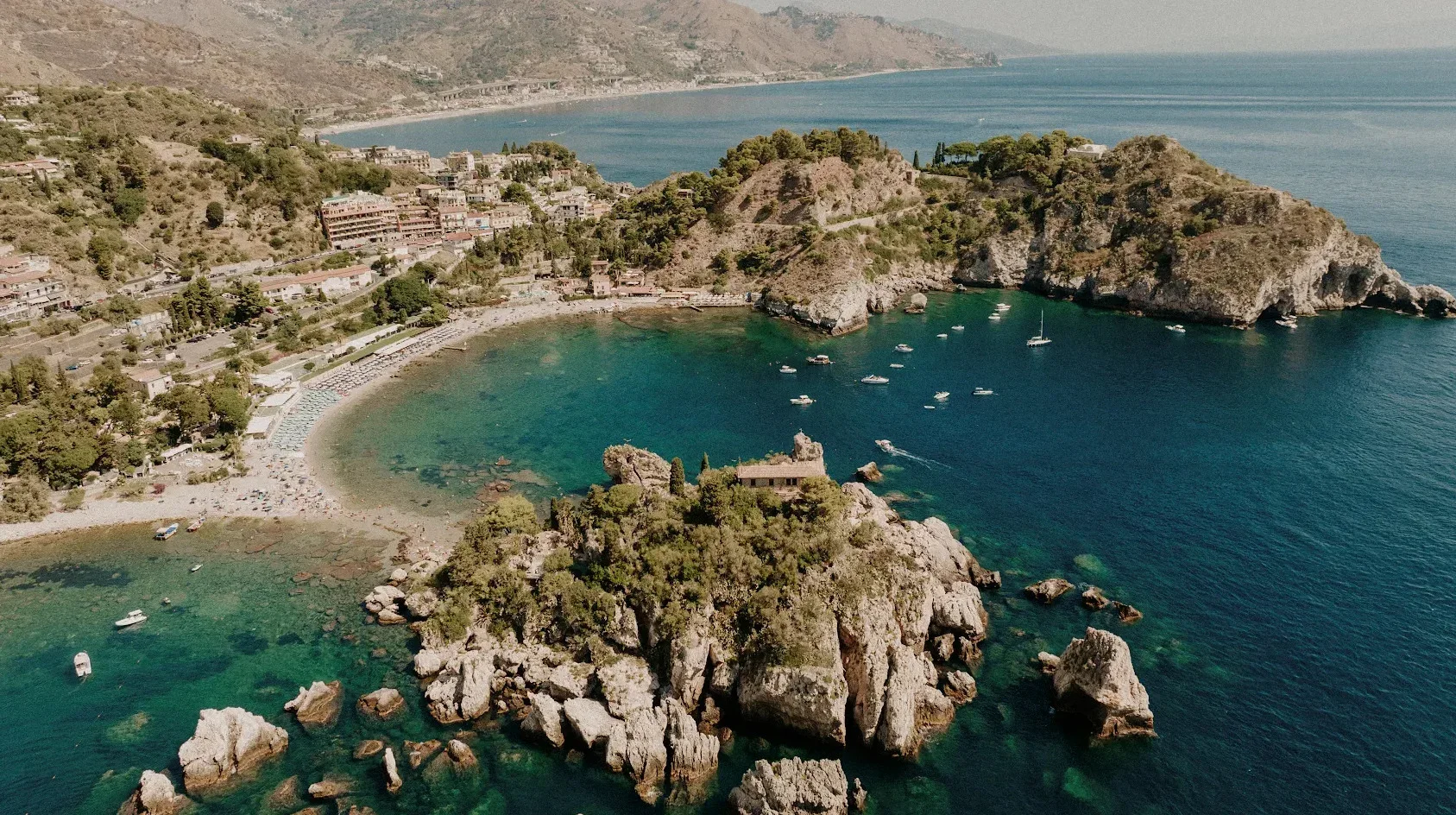 Aerial view of Isola Bella and the coastline of Taormina, Sicily