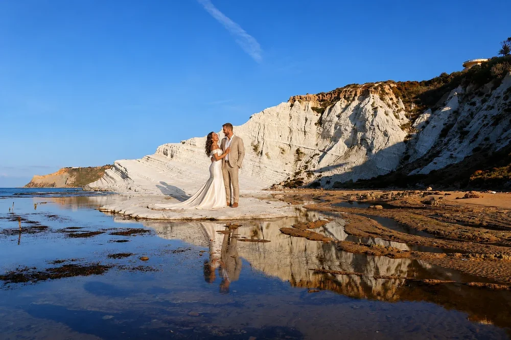 Bride and groom on the white cliffs of the Scala dei Turchi in Sicily