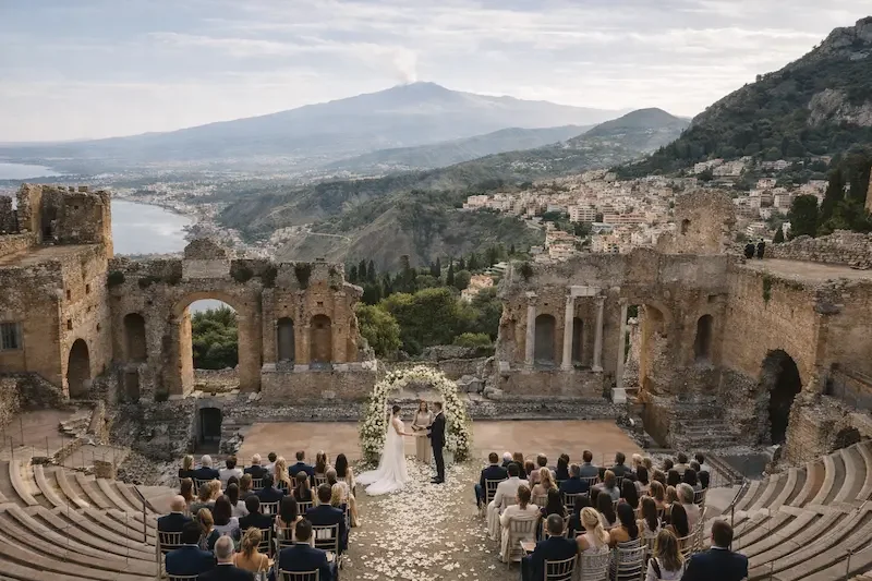 Destination wedding in Taormina Sicily at Greek Theatre filmed by wedding videographer in Sicily