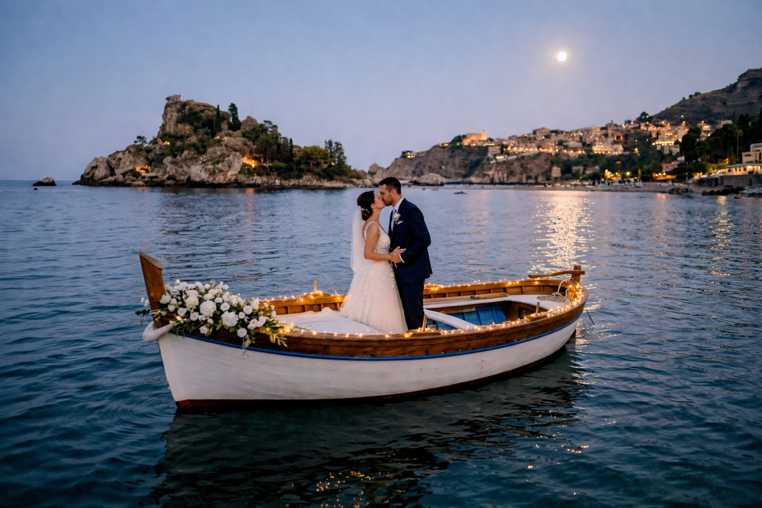 Elegant couple on a boat at Isola Bella in Taormina, Sicily, luxury destination wedding in Italy with sunset sea view and cinematic atmosphere