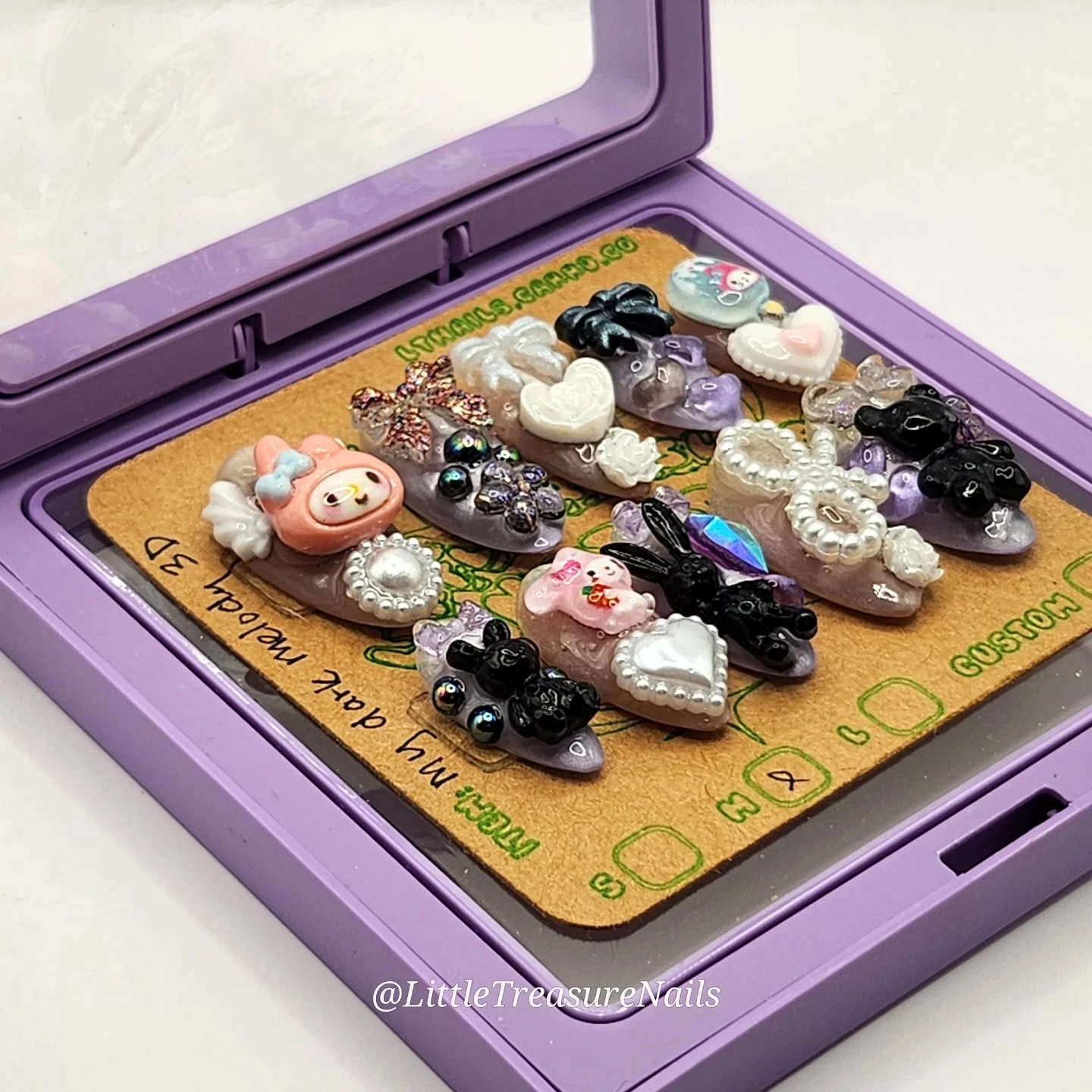 Some product shots I got of the My Dark Melody set (comingoutFeb3) before my phone decided it wanted to overheat. It's fine, though, because you can see the reusable clamshell packaging, home "printed" backing cards that are recyclable if n