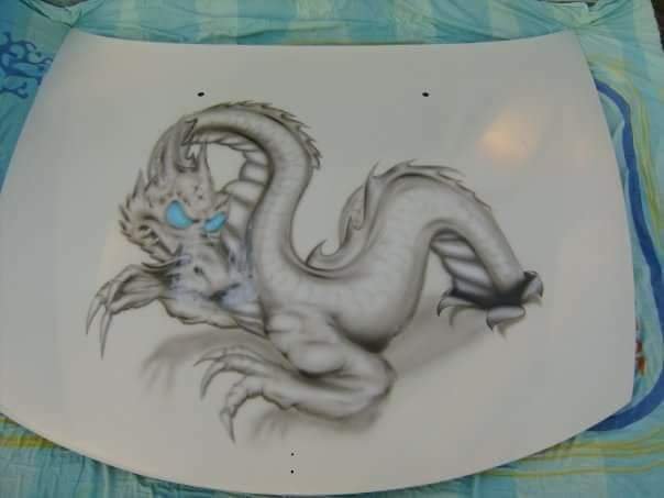Drawing of a mythical creature that combines a tiger and a dragon, featuring a tiger's face with blue eyes and a dragon's serpentine body.