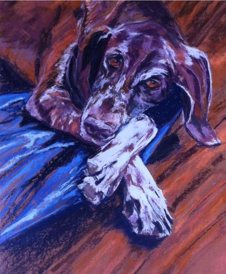 Painting of a brown and white dog lying on a wooden floor, resting its head on a blue cloth.