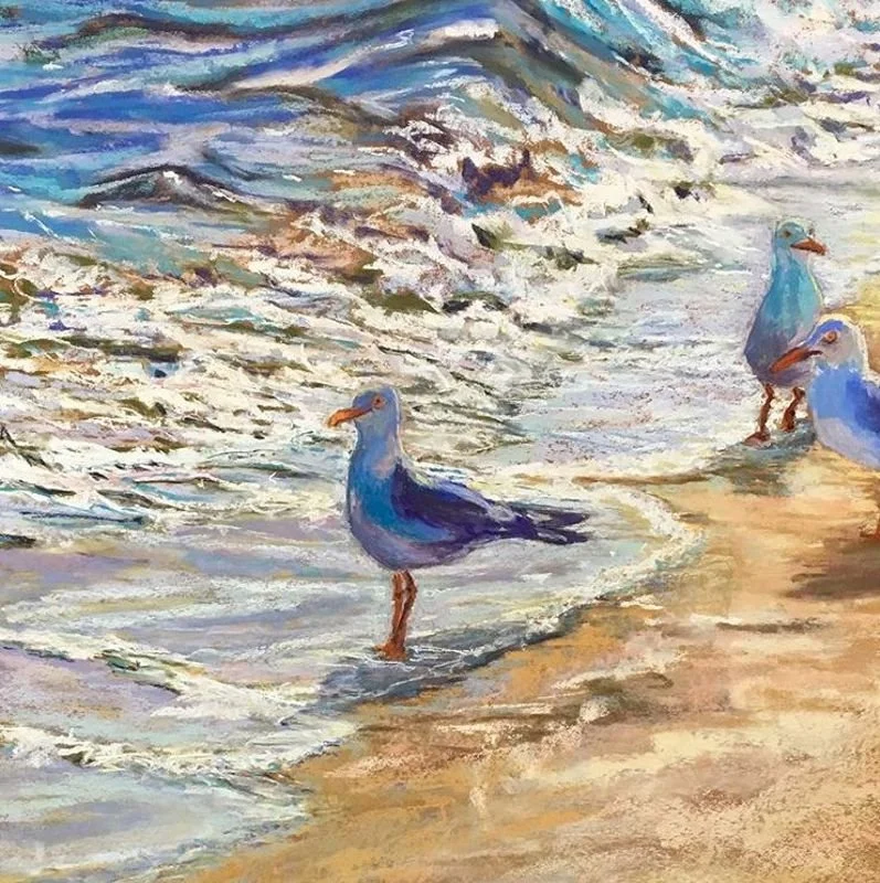 Painted scene of seagulls along a shoreline, with waves crashing onto the beach and three seagulls standing in the shallow water.