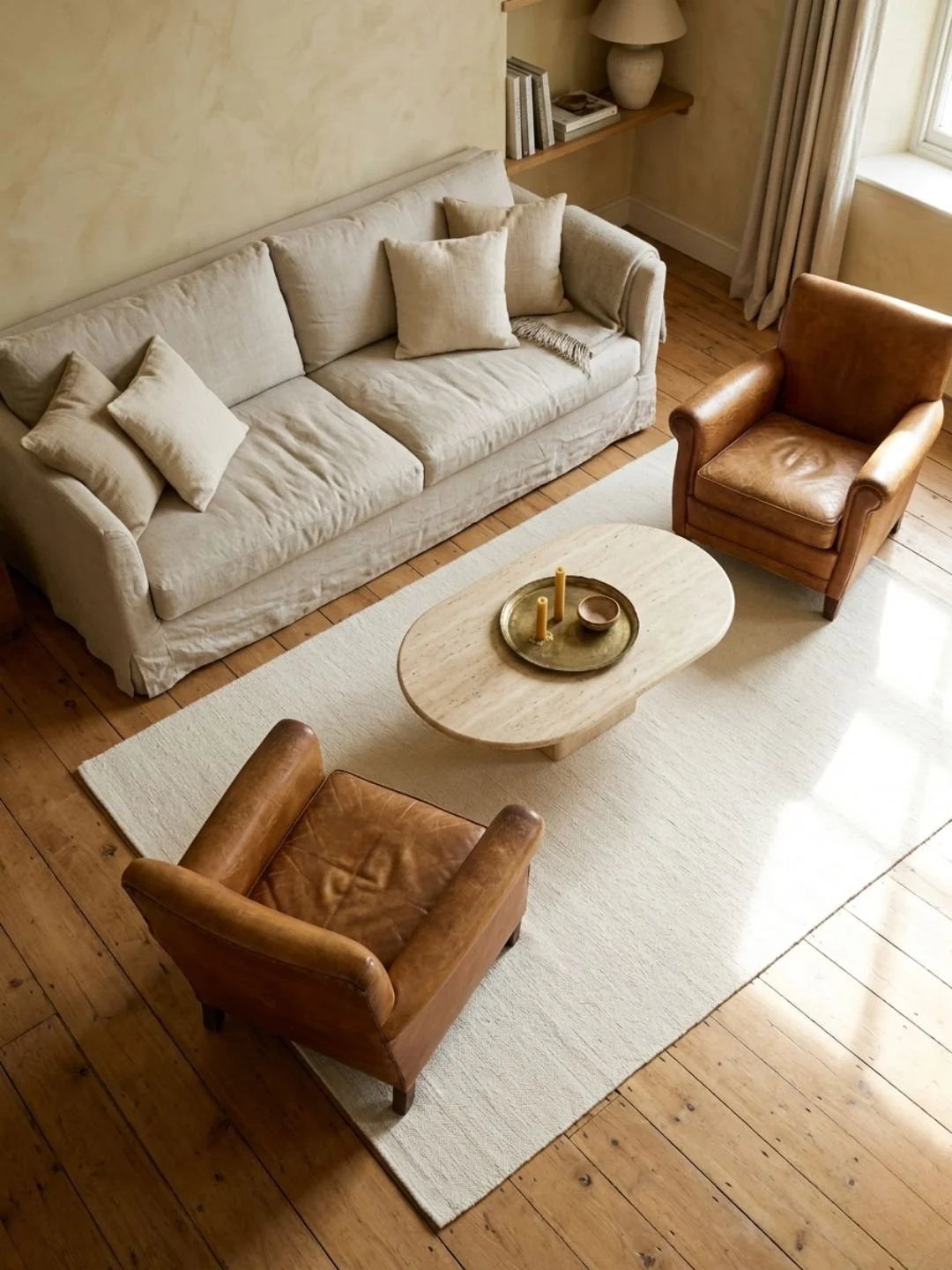 Birdseye view of living room with a couch and two chairs