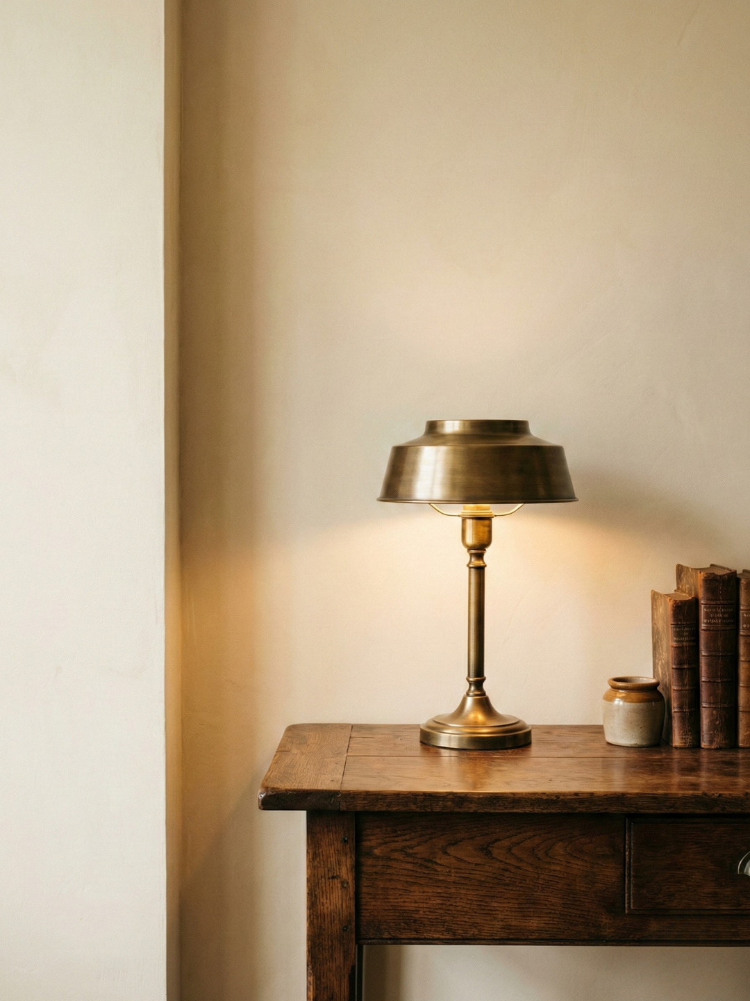 Brass lamp on a wooden table showcasing warm colors
