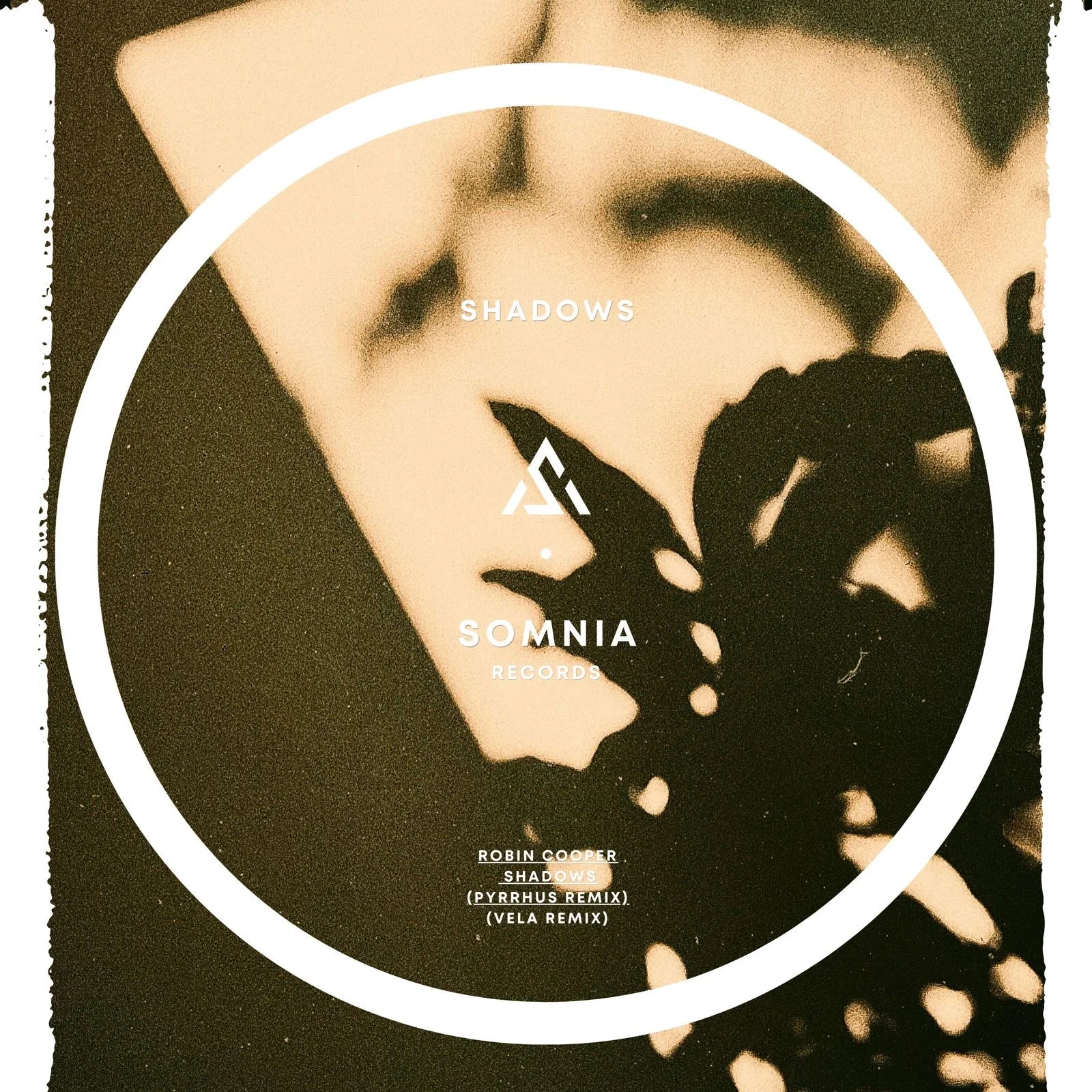 Black-and-white abstract image of a person with shadows cast on their face, with text overlay promoting a music release by Robin Cooper titled 'Shadows', including remixes by Pyrrhus and Vela from Somnia Records.