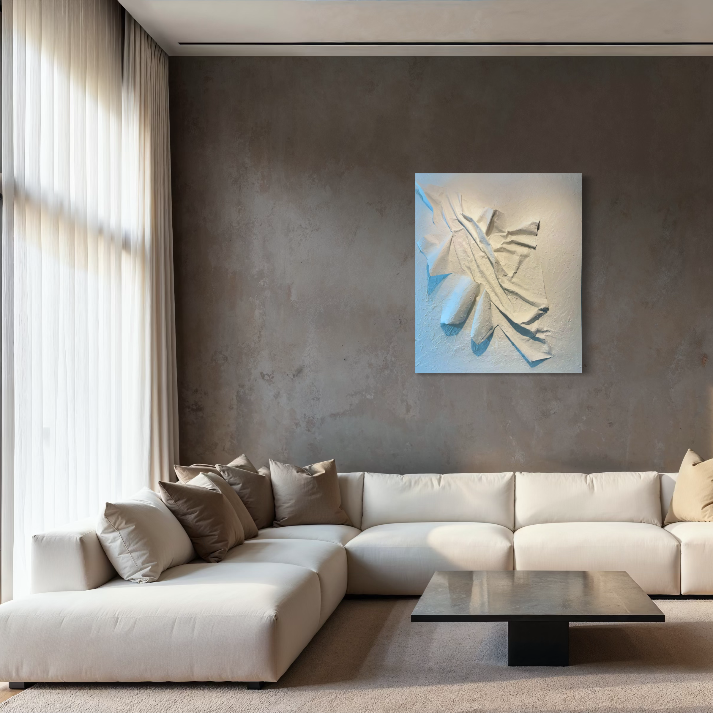 White wall relief by Karina Yacoubian in a living room