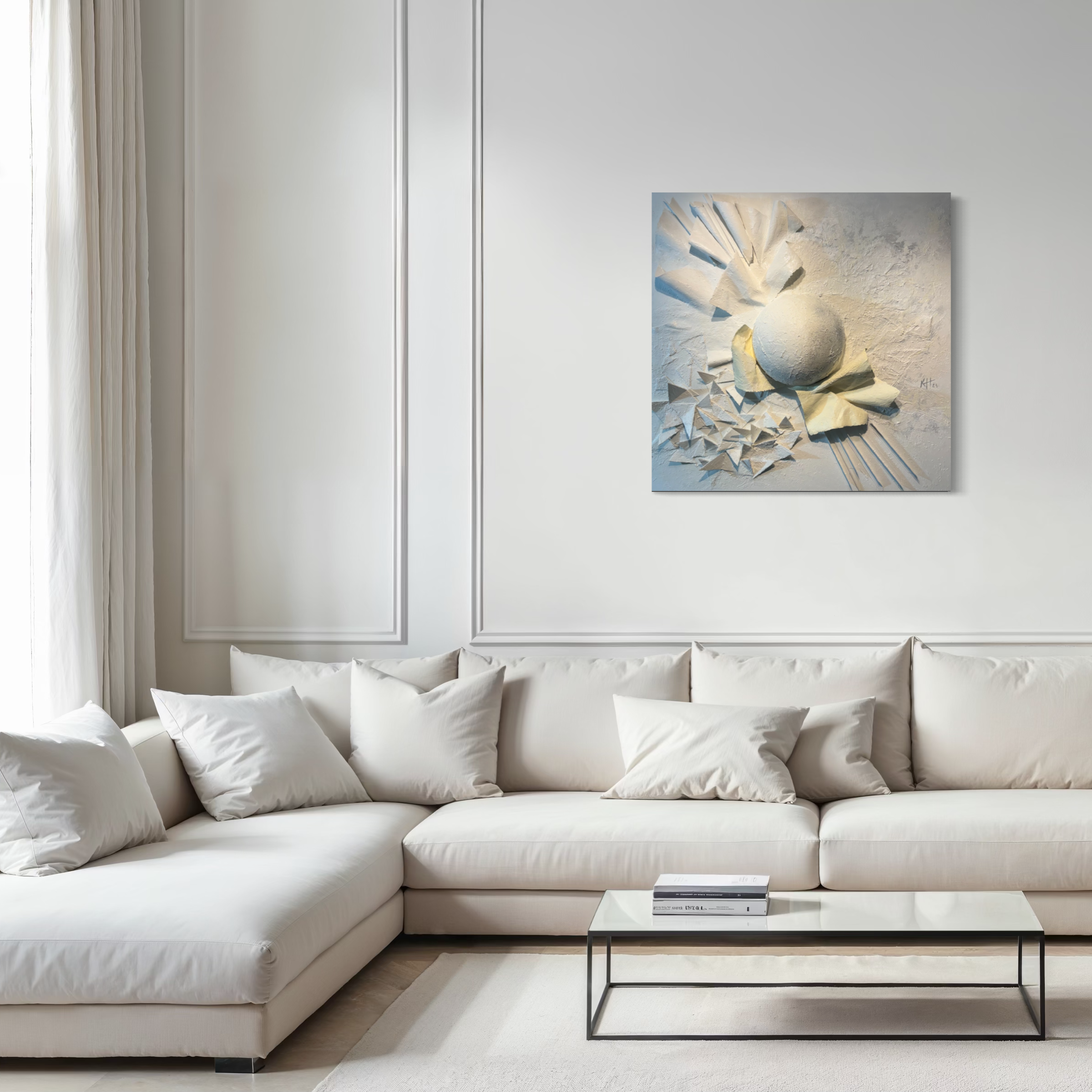 Relief face artwork by Karina Yacoubian in a living room