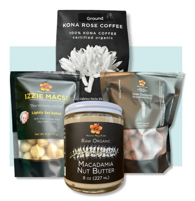 Assorted organic snacks including Kona Rose Coffee, island-grown Macadamia Nuts, flavored Macadamia Nut Butter, and dark chocolate macadamia nuts from Mahina Mela Farm placed against a light-colored background.