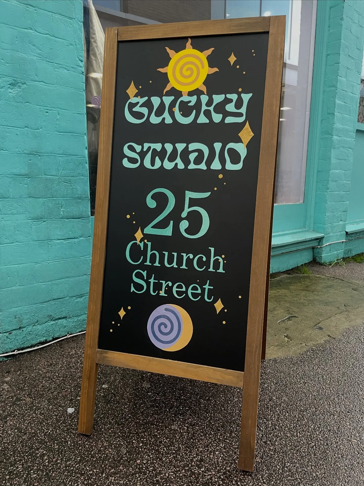 I painted an A-board for @guckystudio ! 🌀🌀

You&rsquo;ll have to walk past irl to truly admire the holographic stars ✨