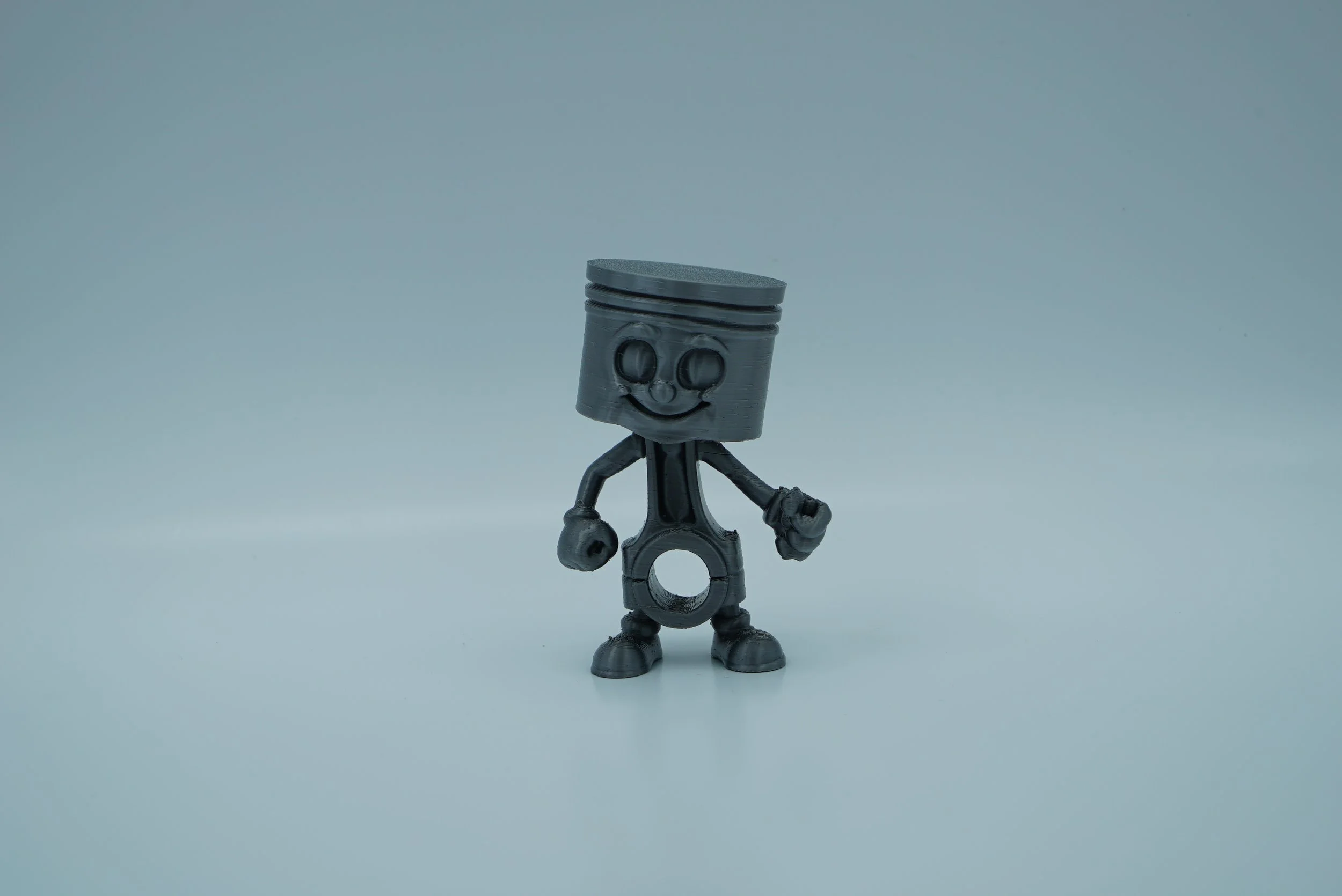 Piston Figurine