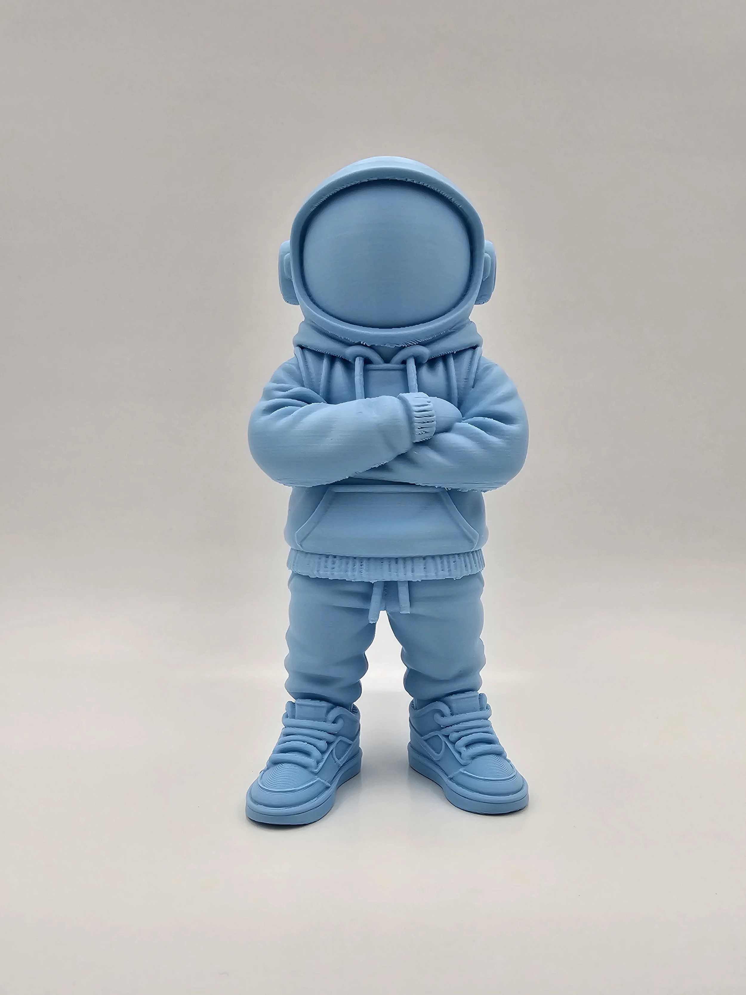 Blue Astronaut Figurine