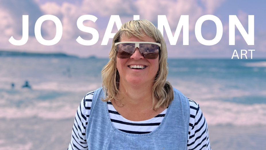 A woman smiling on a beach with ocean waves in the background, wearing sunglasses, a striped shirt, and a denim vest, with text overlay reading "Jo Samon Art".