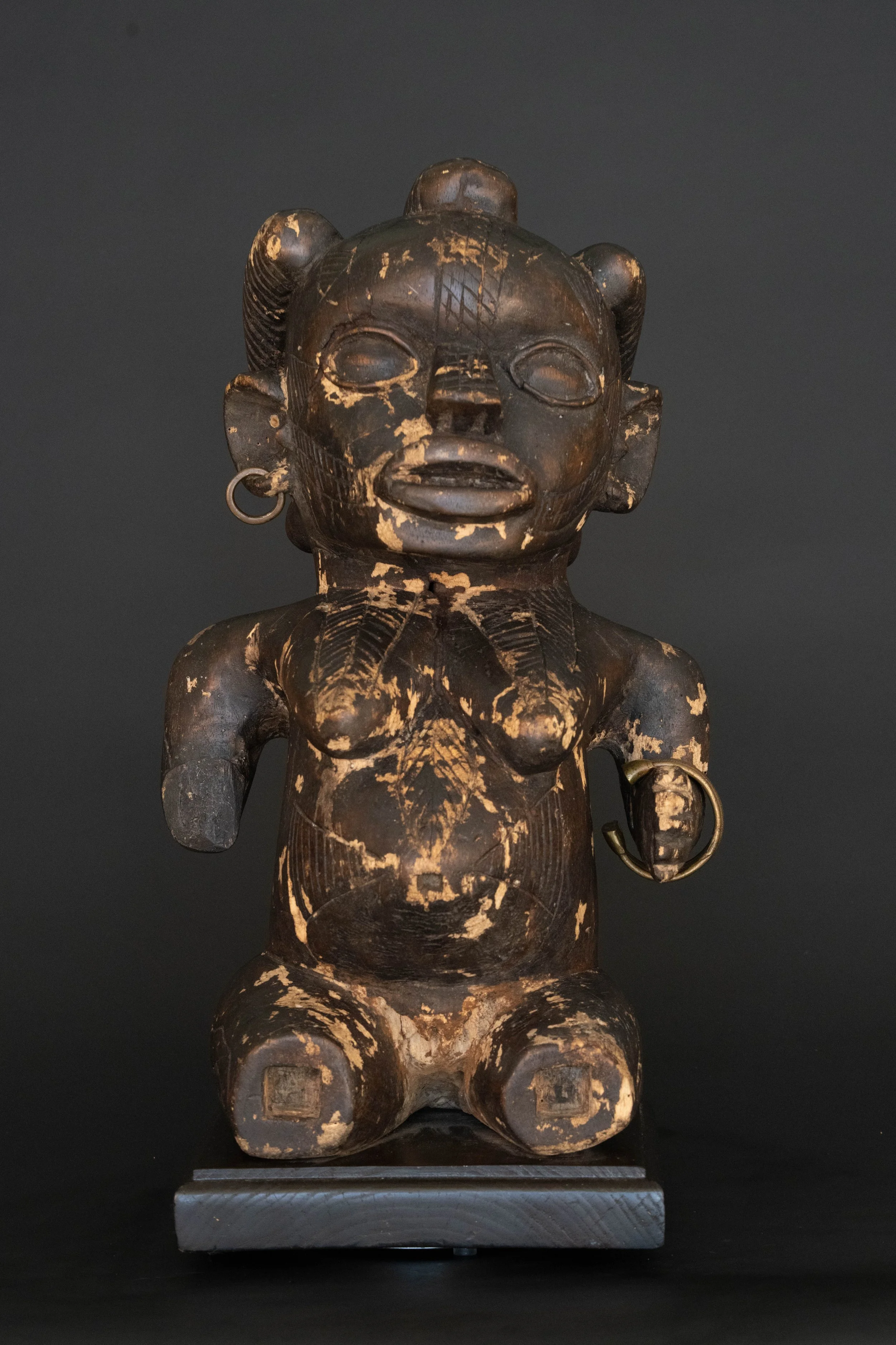 Bassa Seated Female Figure with Brass Jewelry, Liberia