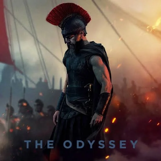 Cover image from the movie The Odyssey showing a man standing in Ancient Greek armour.