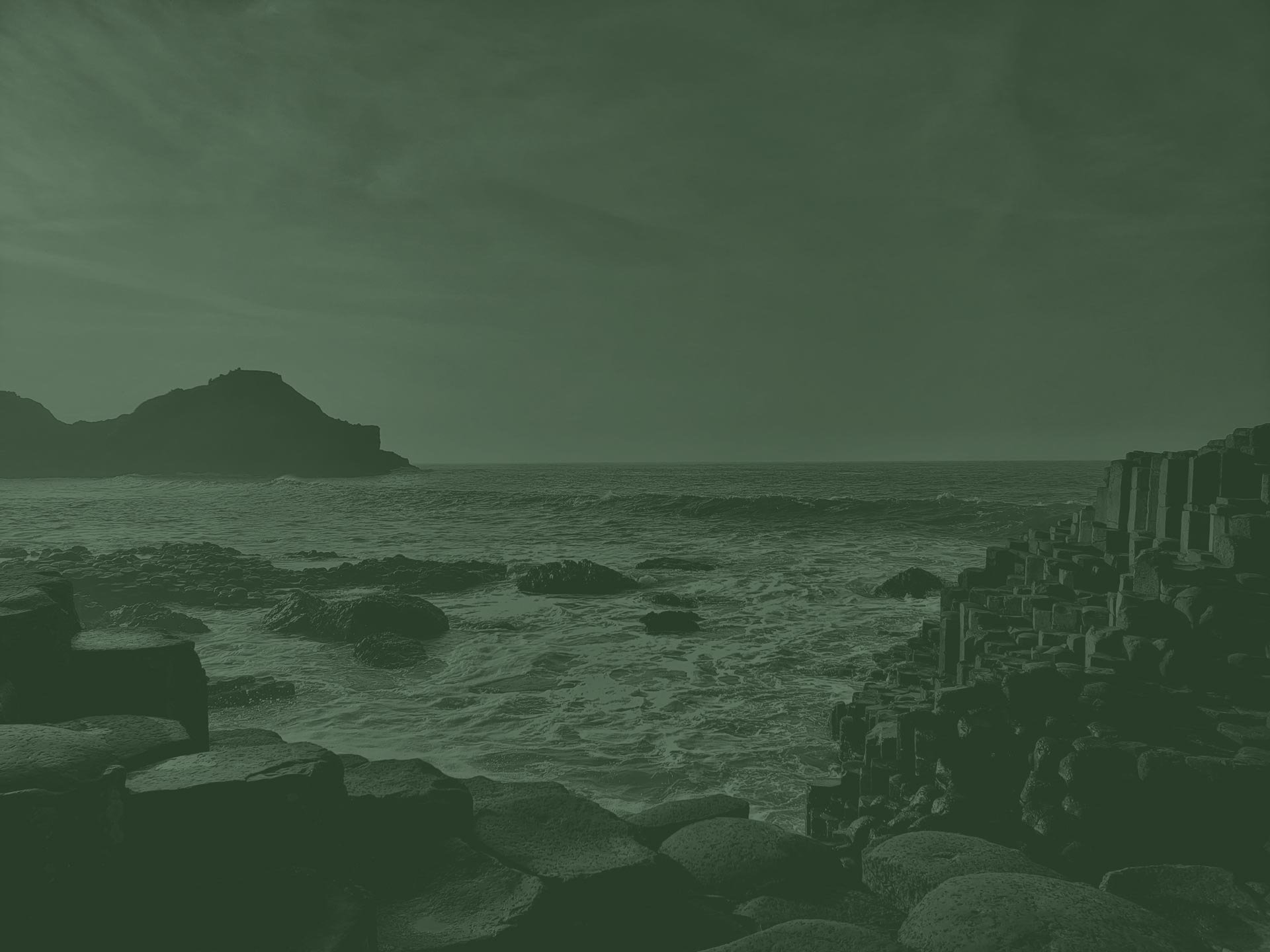 Photograph of the Giant's Causeway in Northern Ireland, a UNESCO World Heritage Site formed by ancient volcanic activity, and the legendary tale of the Irish giant Fionn Mac Cumhaill (Finn McCool)