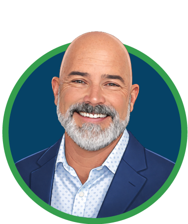 A smiling middle-aged man with a gray beard and mustache, bald head, wearing a blue suit jacket and a light blue dress shirt, against a navy blue circular background with a green border.