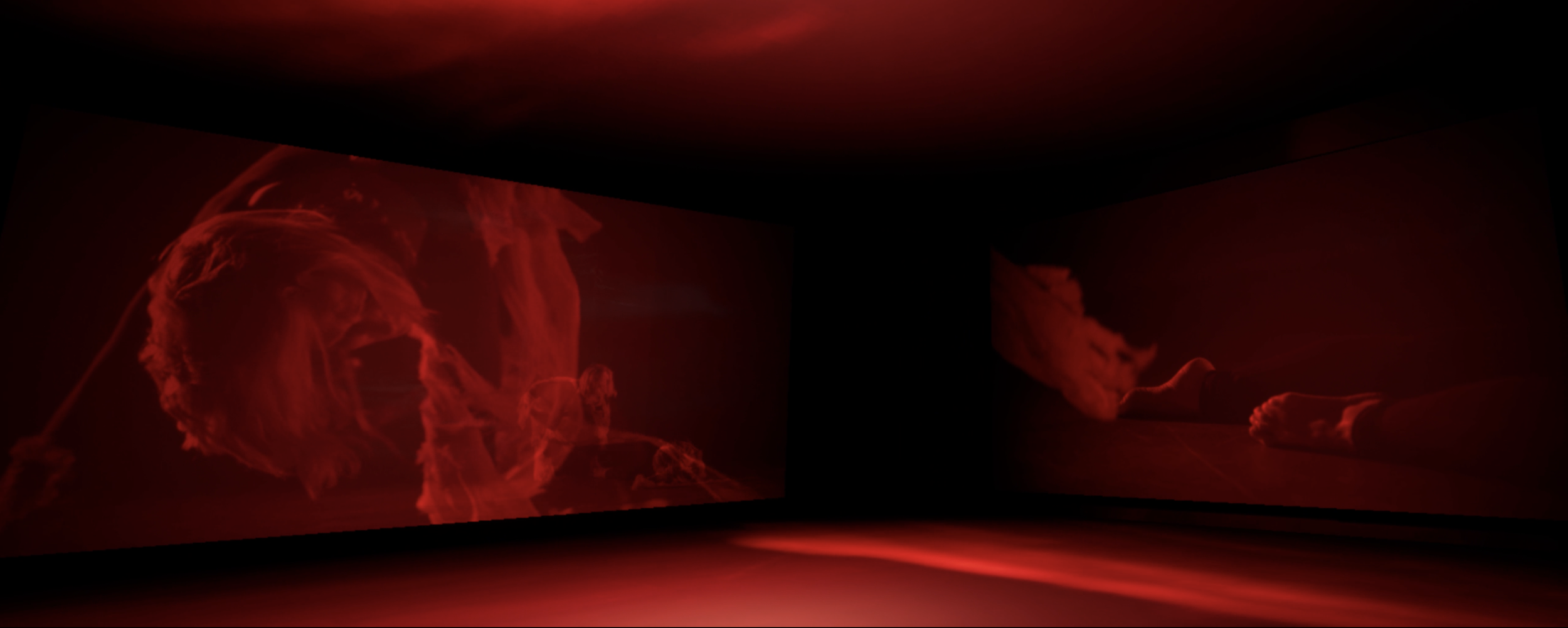 Dark room with two red illuminated digital screens displaying abstract red lines and shapes, one on the left wall and another on the right, creating a vivid, immersive visual experience.