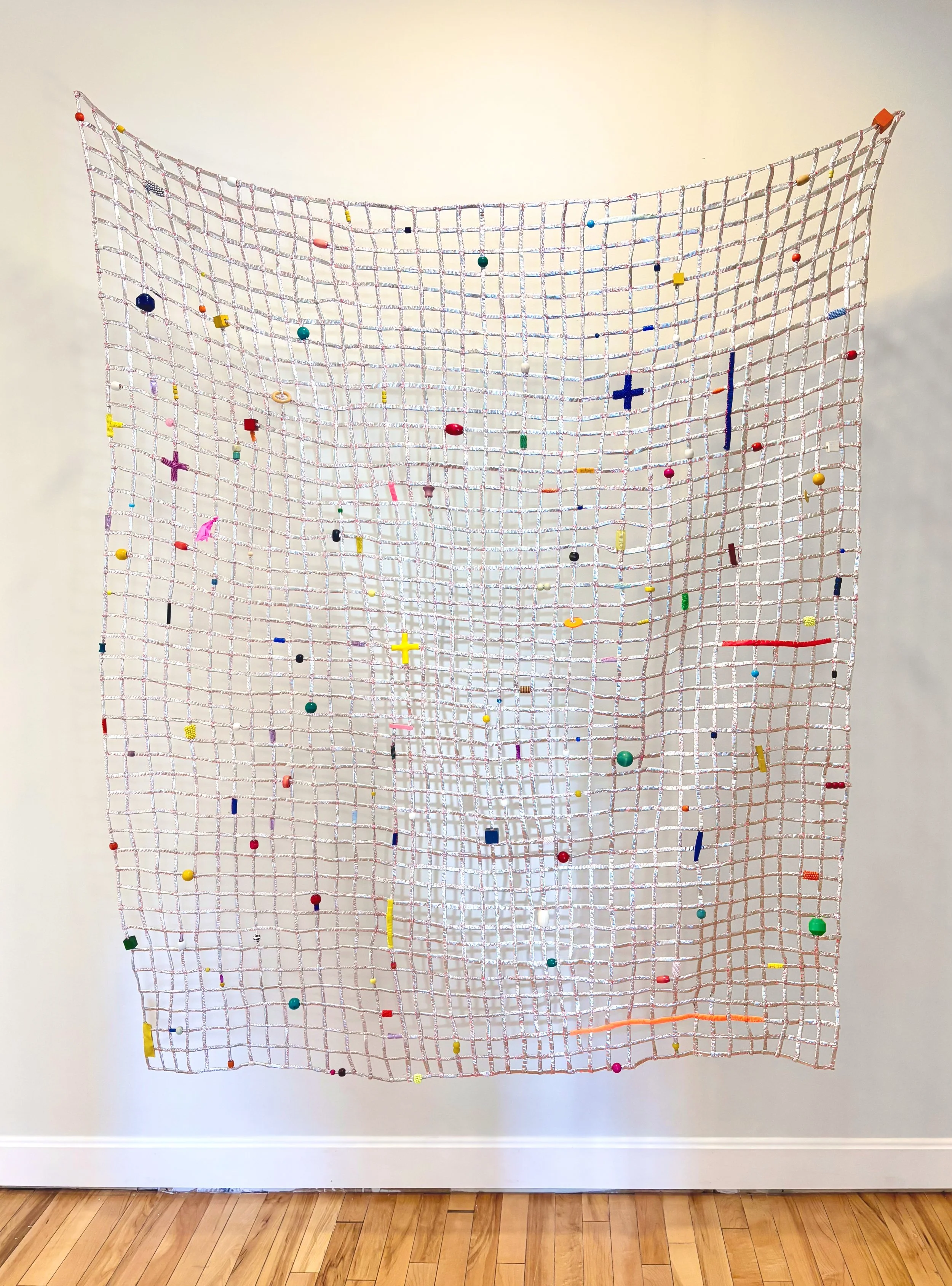 Eleanor Anderson “Silver Lattice (prototype)” silver fabric, wooden beads, beads, flameworked glass, ceramic, crochet, felt. 6,000.
