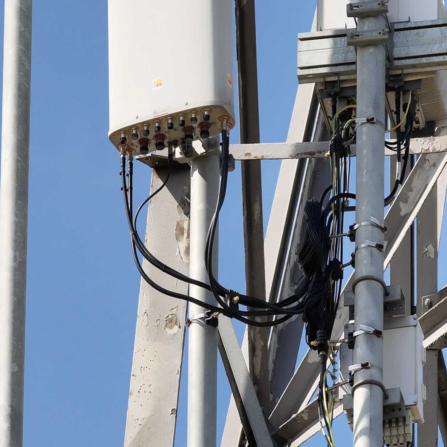 High-accuracy telecommunications mast structural survey. Utilizing drone-based aerial imaging allows engineering teams to perform comprehensive line-of-sight audits, evaluate mount integrity, and verify cable routing layouts remotely and safely.
