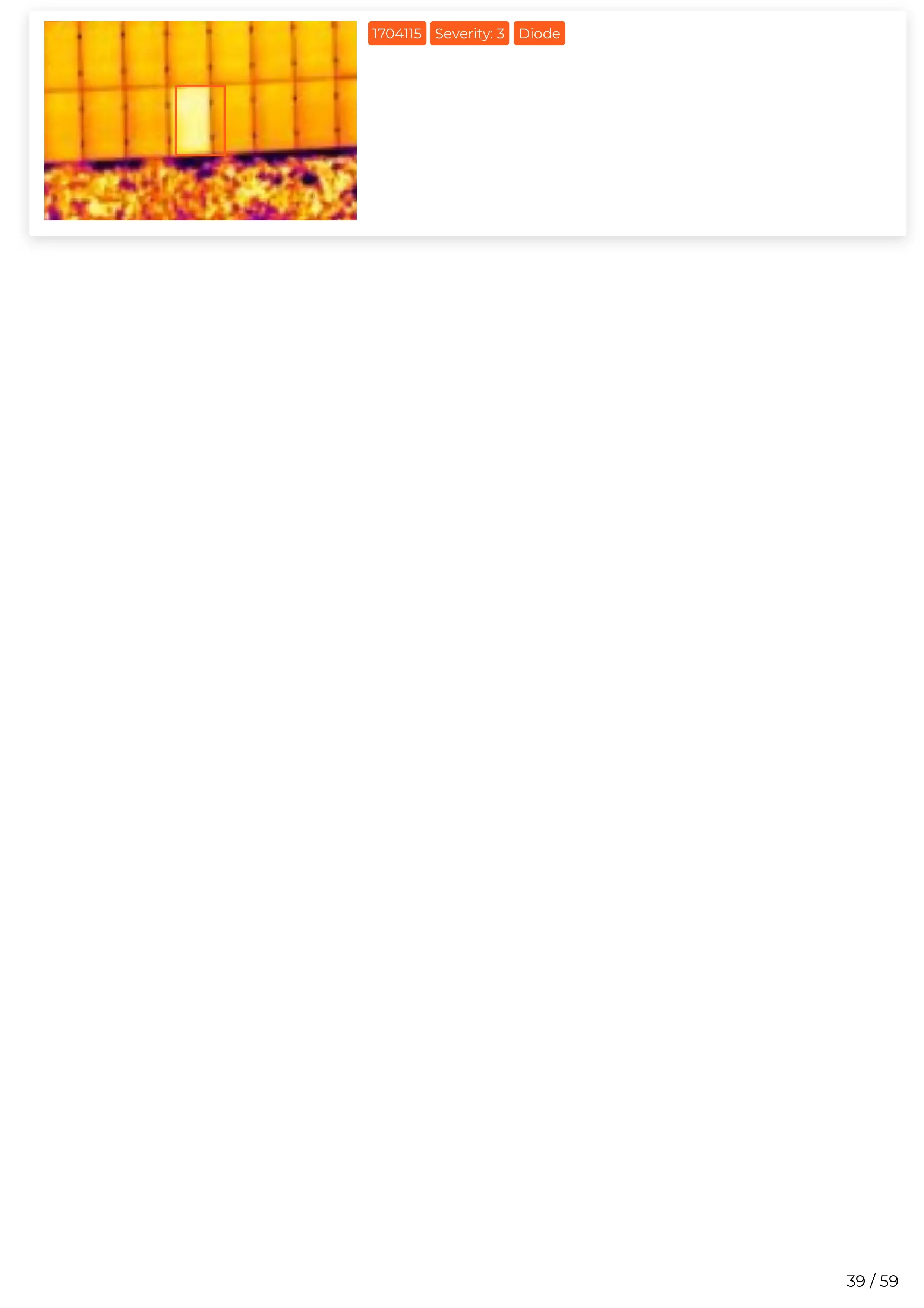 Infrared image of a door against a background of bright yellow and orange panels with a textured ground surface.