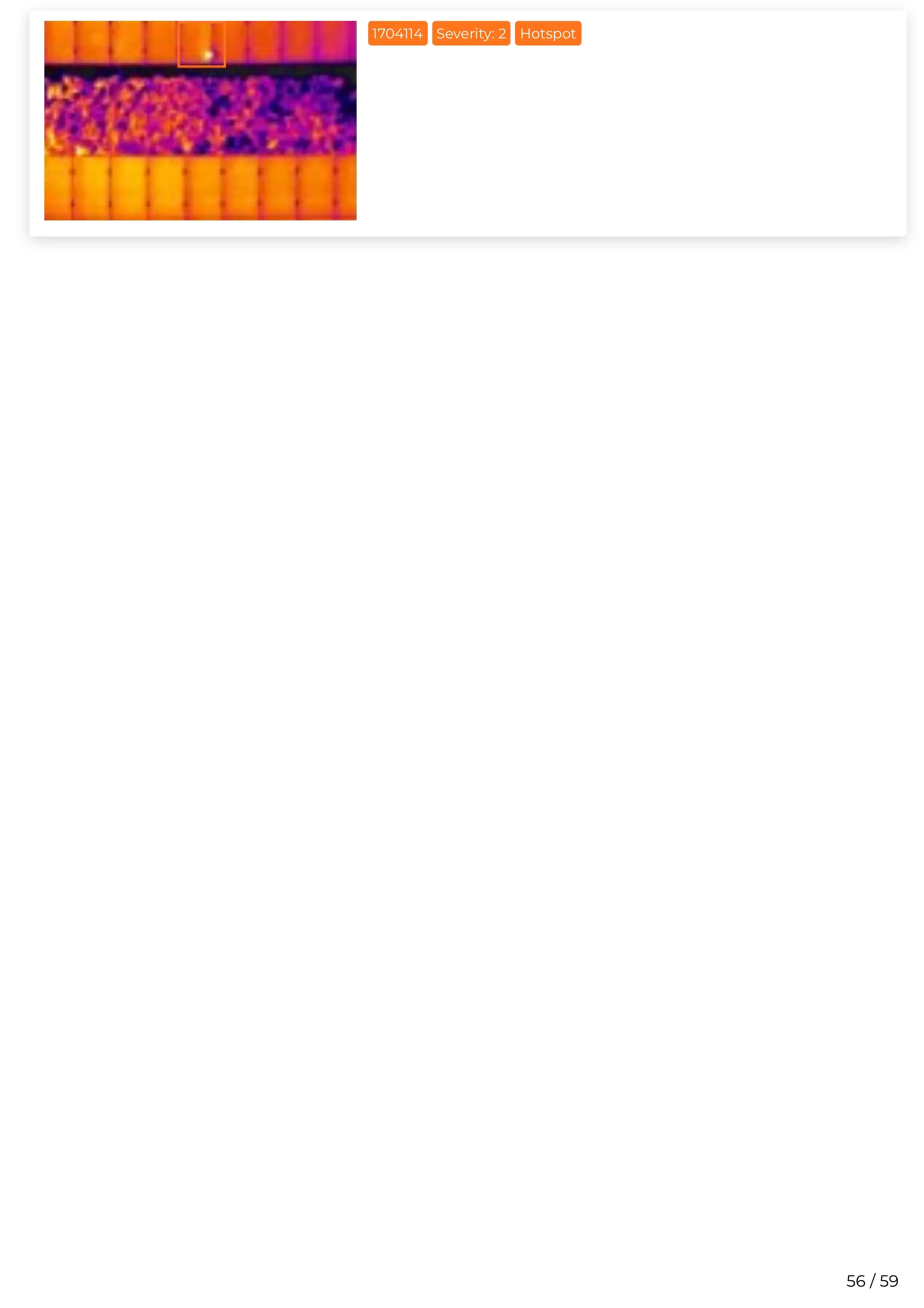 Thermal image of a building with color variations indicating heat on the roof and surrounding area.