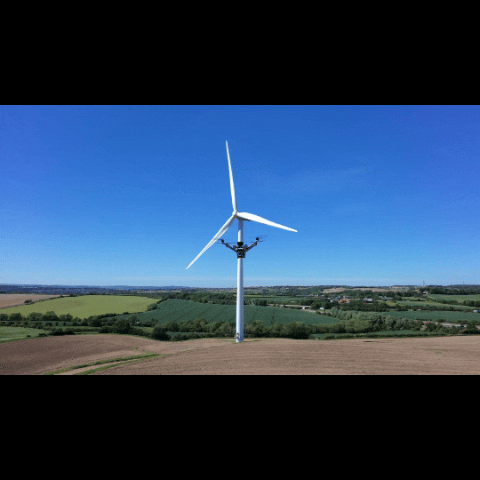 Drone flying around a large wind turbine in the Yorkshire countryside - Speedee AerialWorks