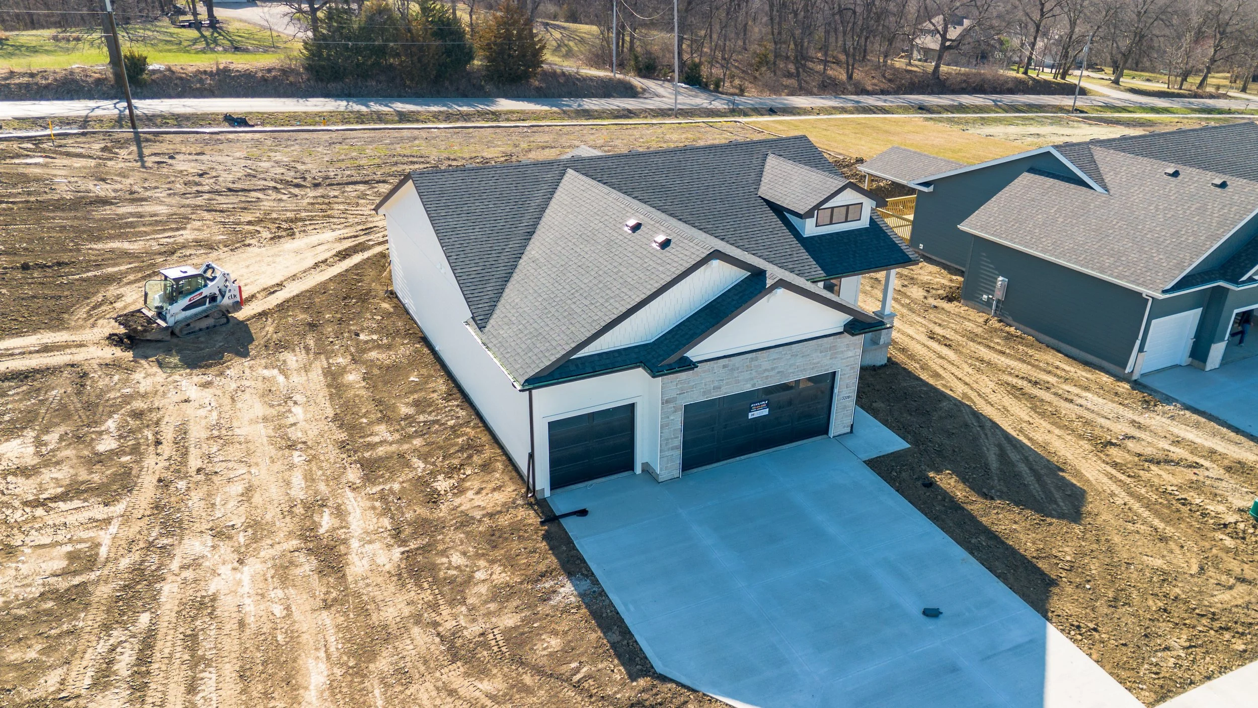 Aerial front view of Hubbell home in Ankeny, Iowa - Real Estate Photography