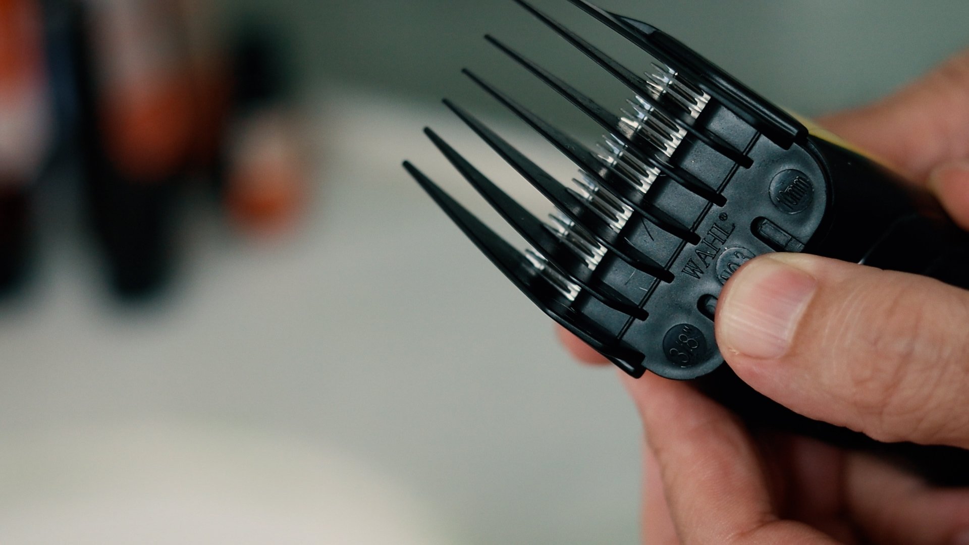 Detalhe de um pente número 3 de uma máquina de aparar a barba