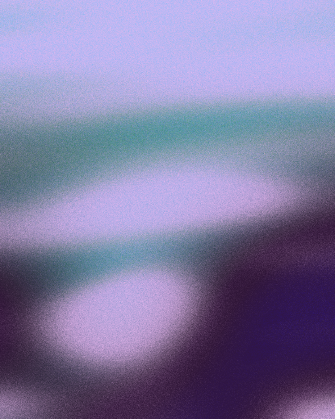 Blurred abstract background with shades of purple, green, and black.