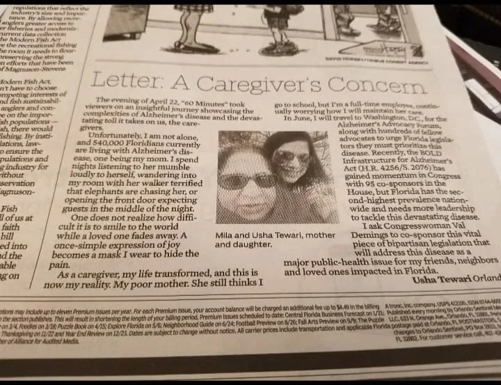 A newspaper article titled "Letter: A Caregiver's Concern" featuring a photo of Mila and Usha Tewari, mother and daughter, wearing sunglasses and smiling.