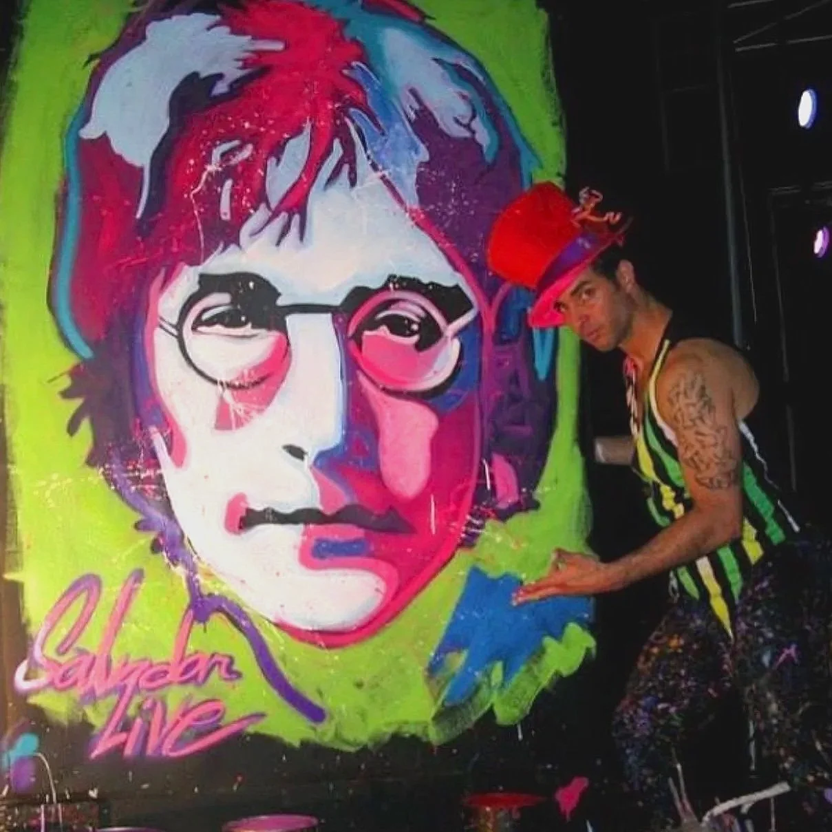 John Lennon paint show at a corporate party 