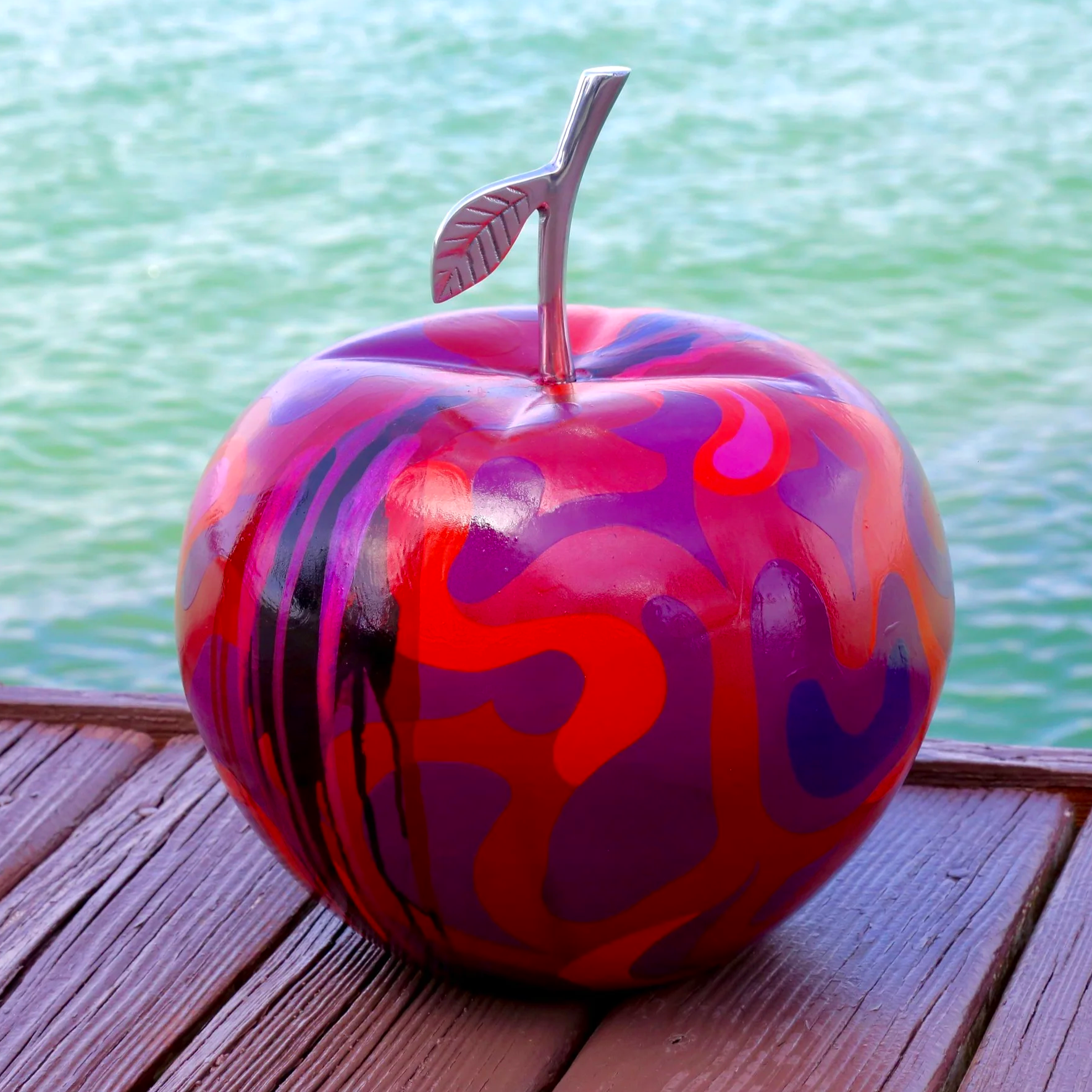 large apple sculpture painted 