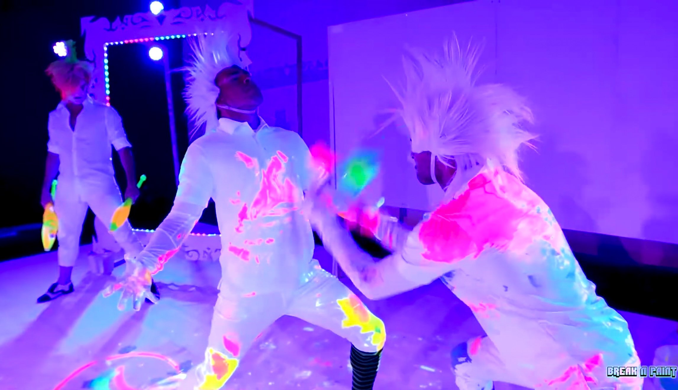 Breakdancing in paint, adding color to dance on 