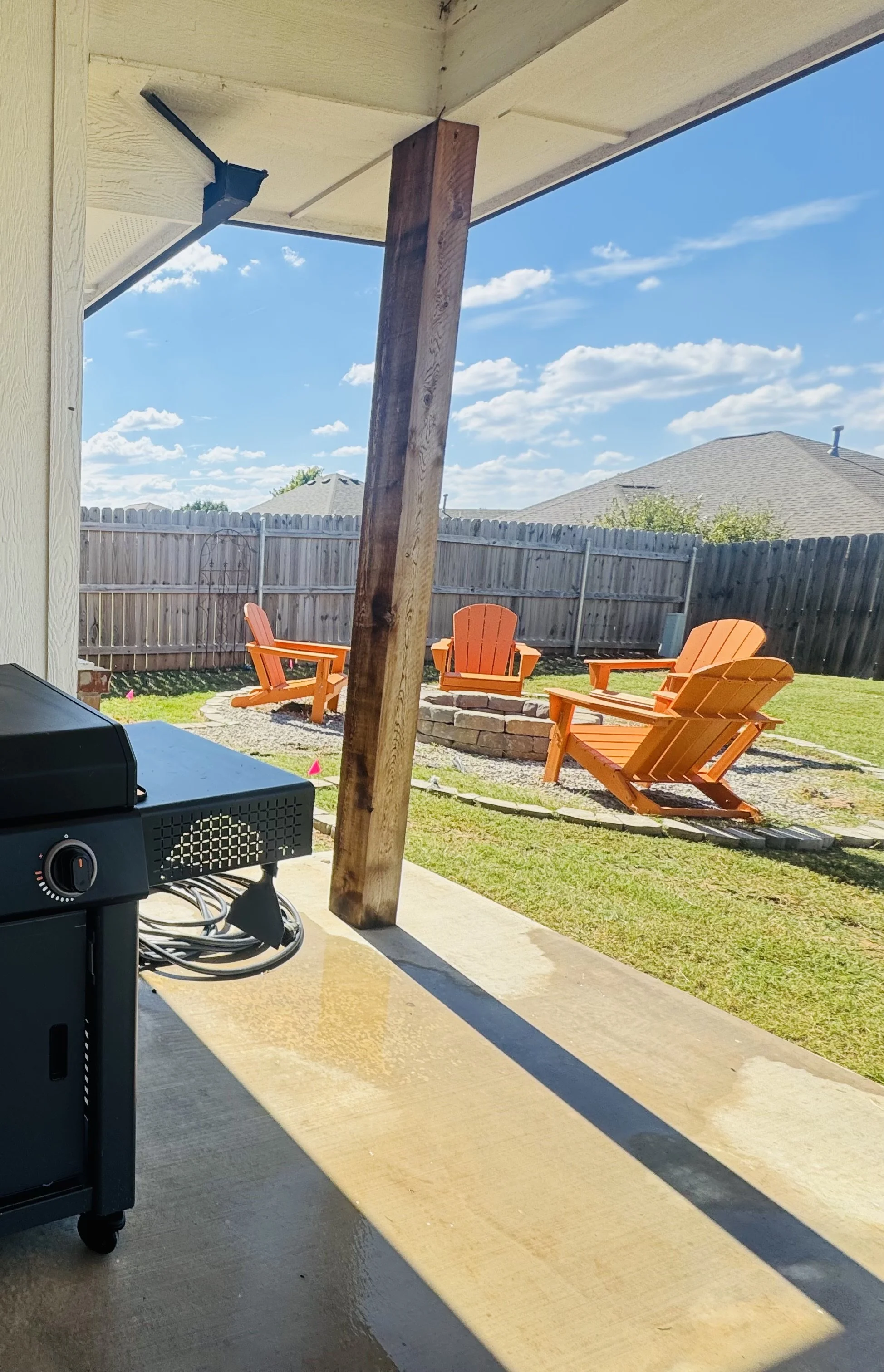 Cozy outdoor fire pit at Grandview Farmhouse retreat in Stillwater Oklahoma