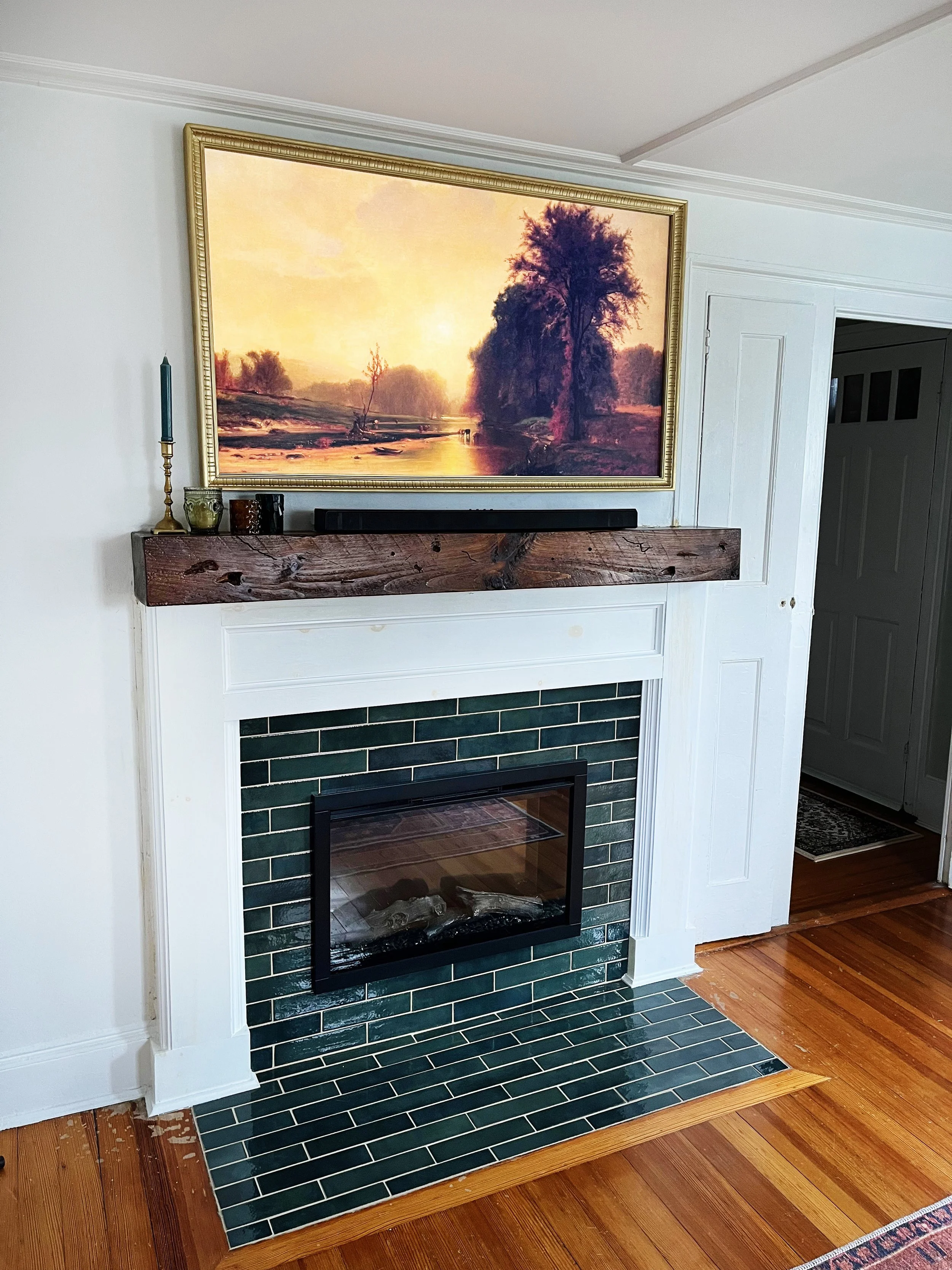 Wall mounted TV installation in South Shore home in Hanover MA by licensed electrician.
