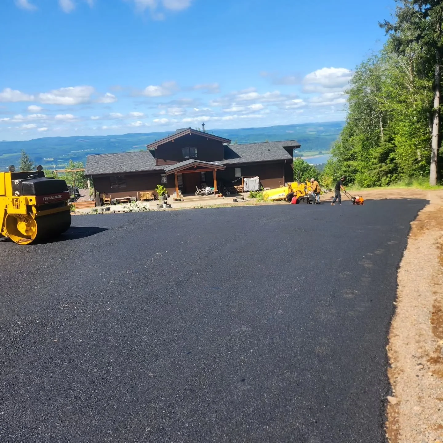 On this job , we graded the driveway dealing with many drainage and gradeing issues on a steep slope then and had a subcontractor pave when we were done.