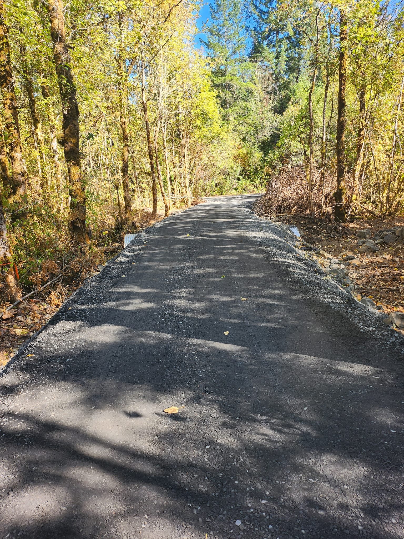 Roadbuilding, culvert, finish grading