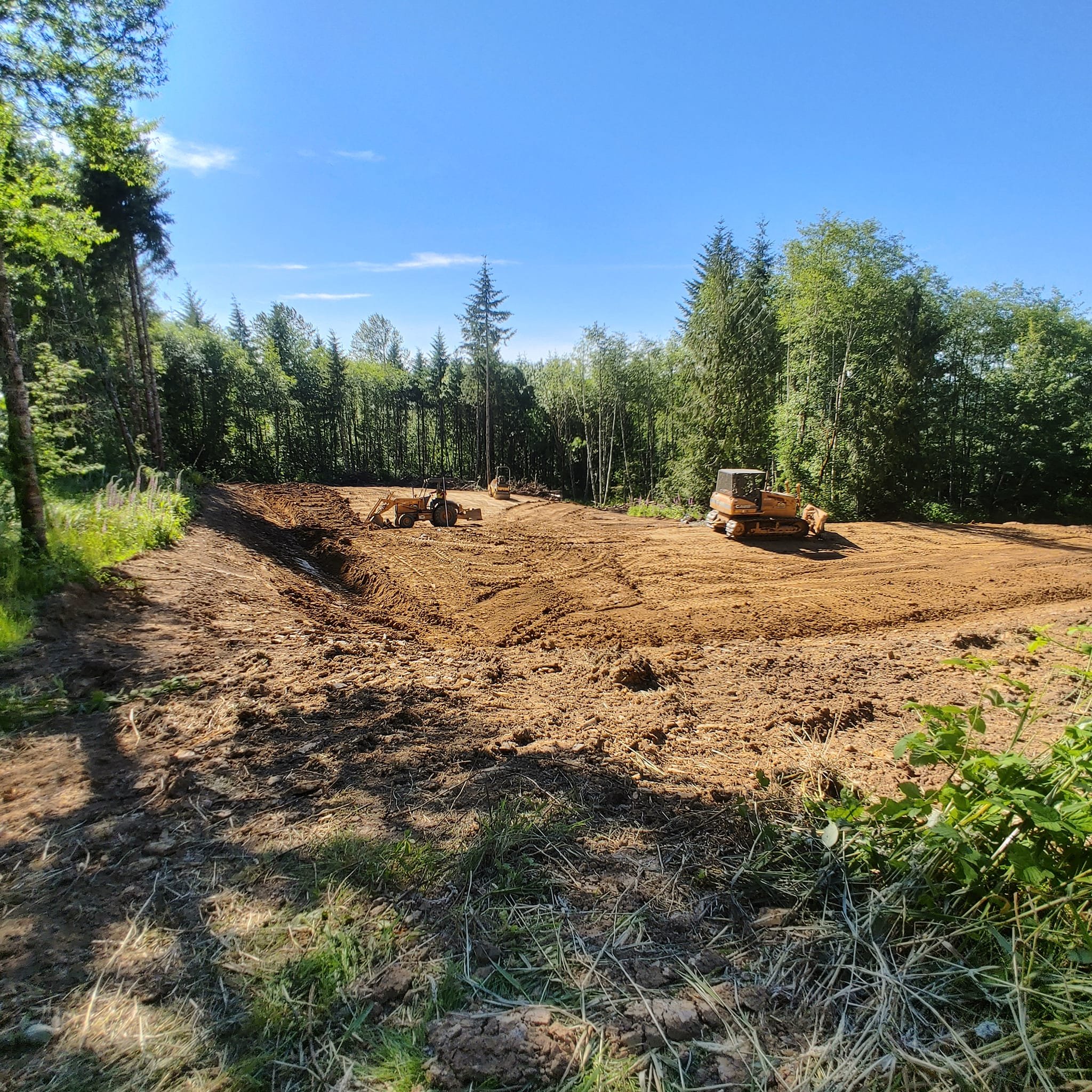 Cut and fill grading project, dozer, skip loader, compaction