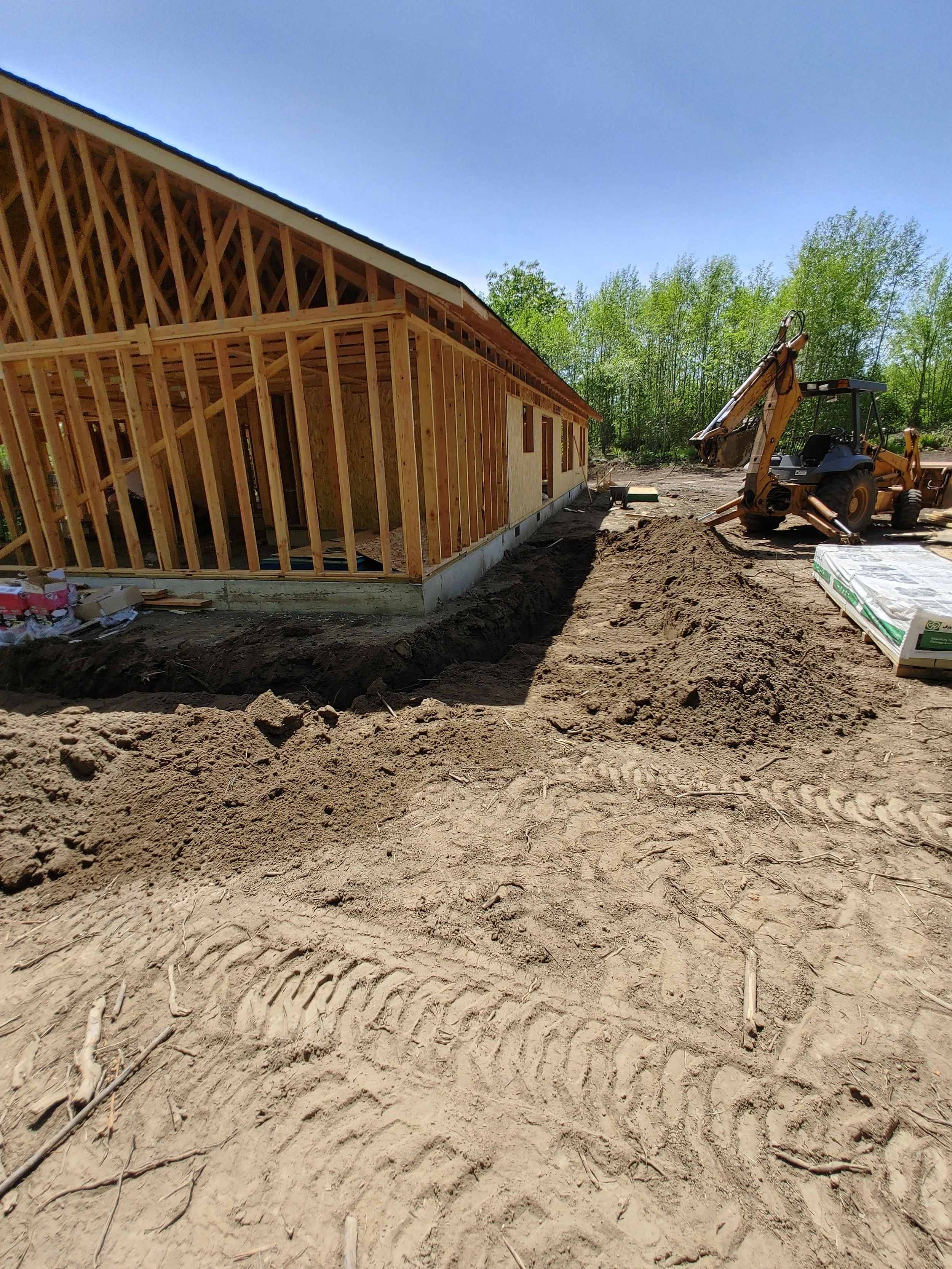 Backfilling foundation on framed home Toledo, WA