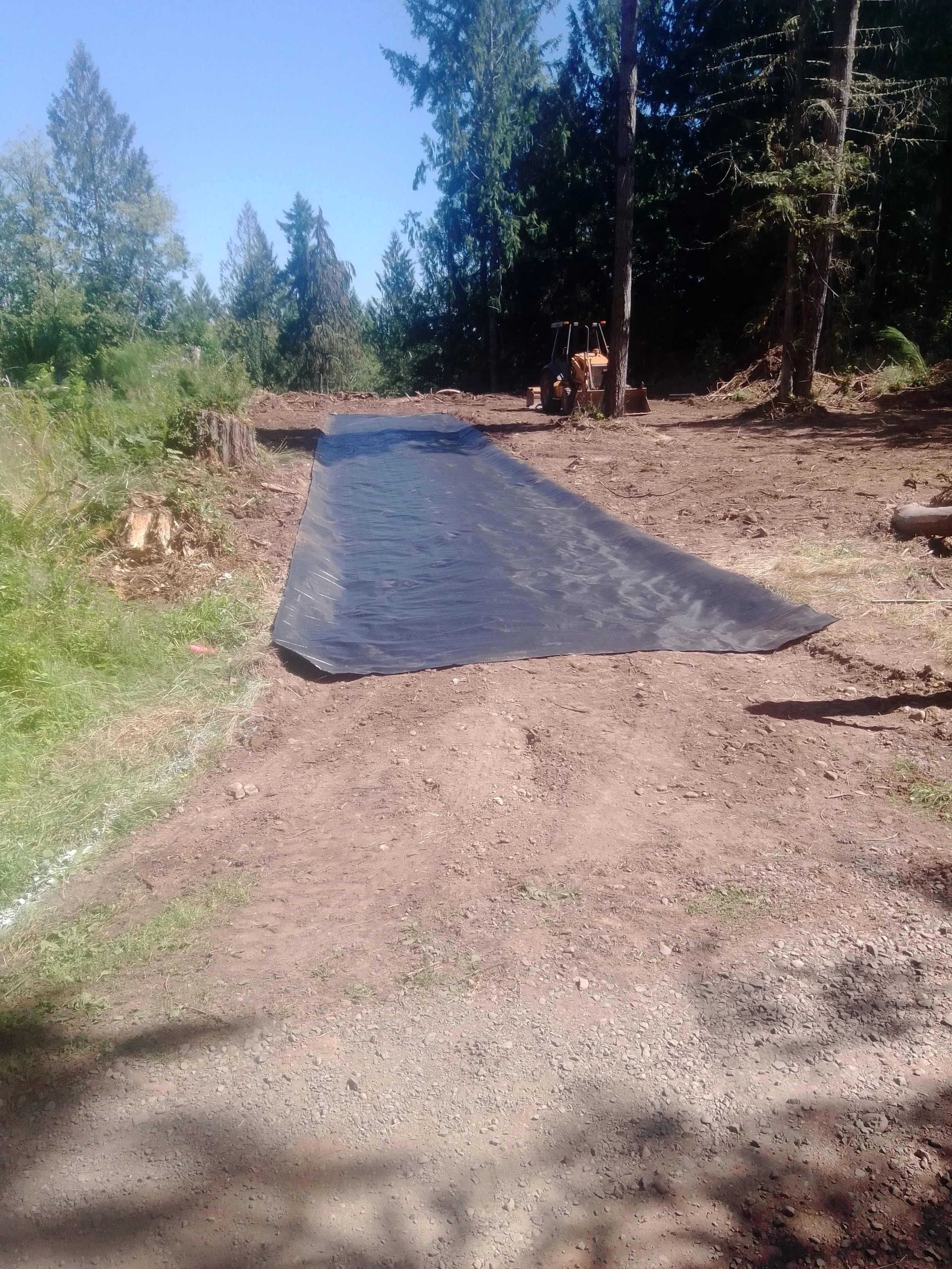 Installing stabilized construction entrance on a project in Cowlitz County WA